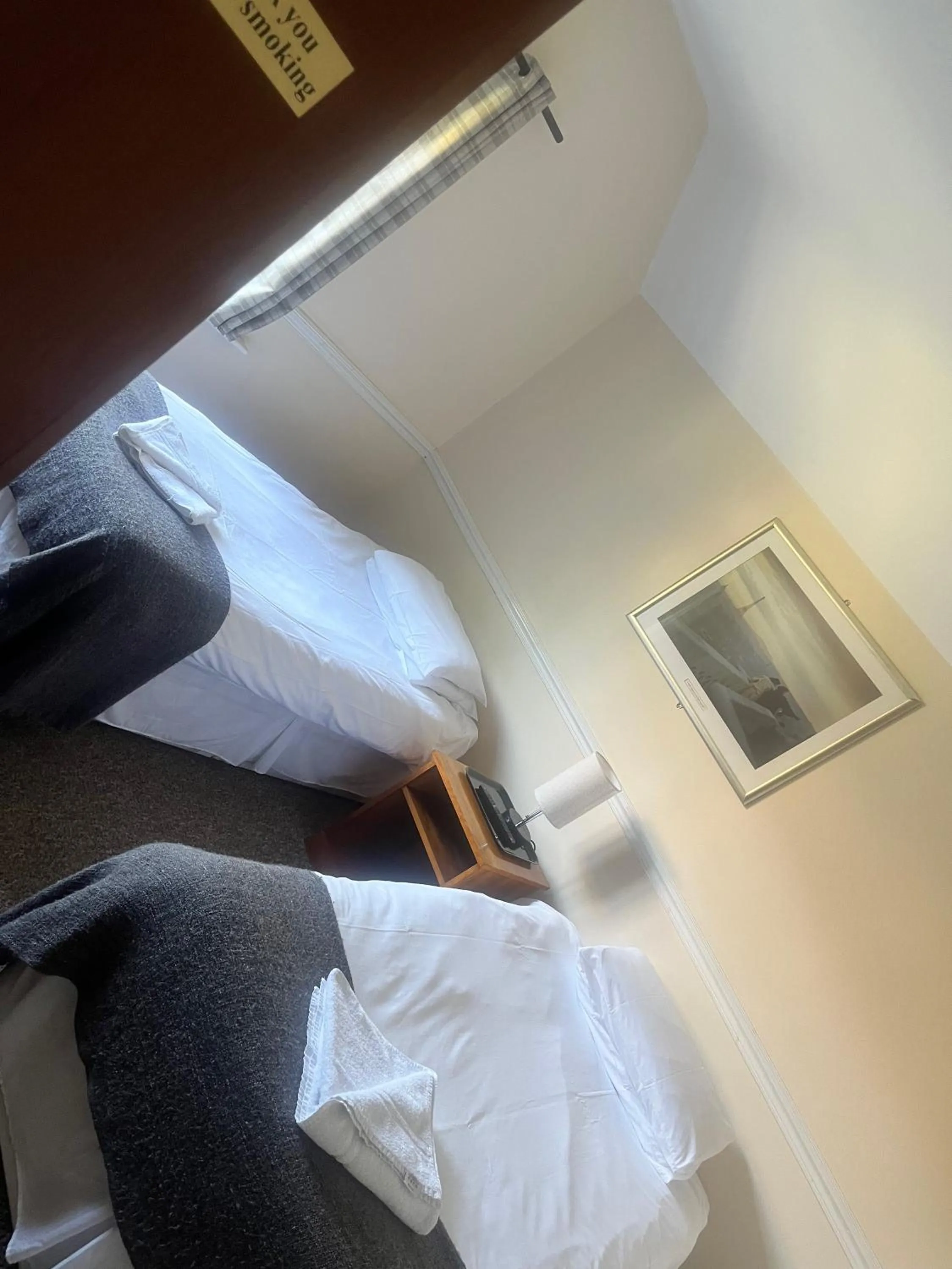 Bed in The Admirals Inn Guest House