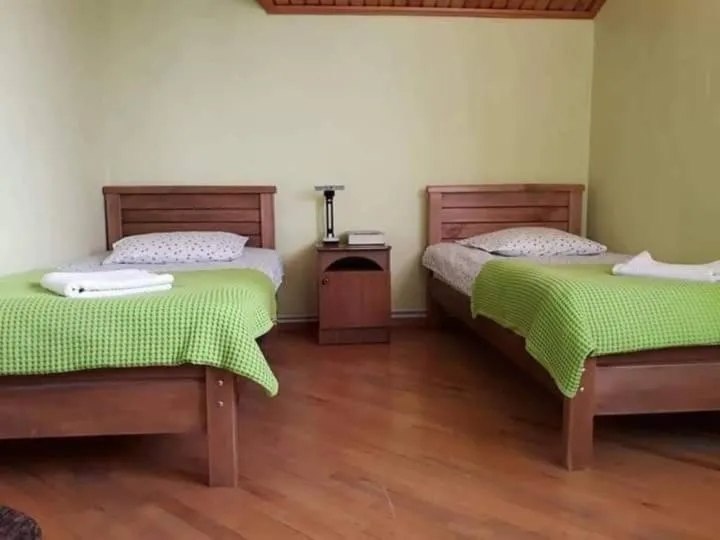 Bed in Safari House Tbilisi Wine & Family Hotel