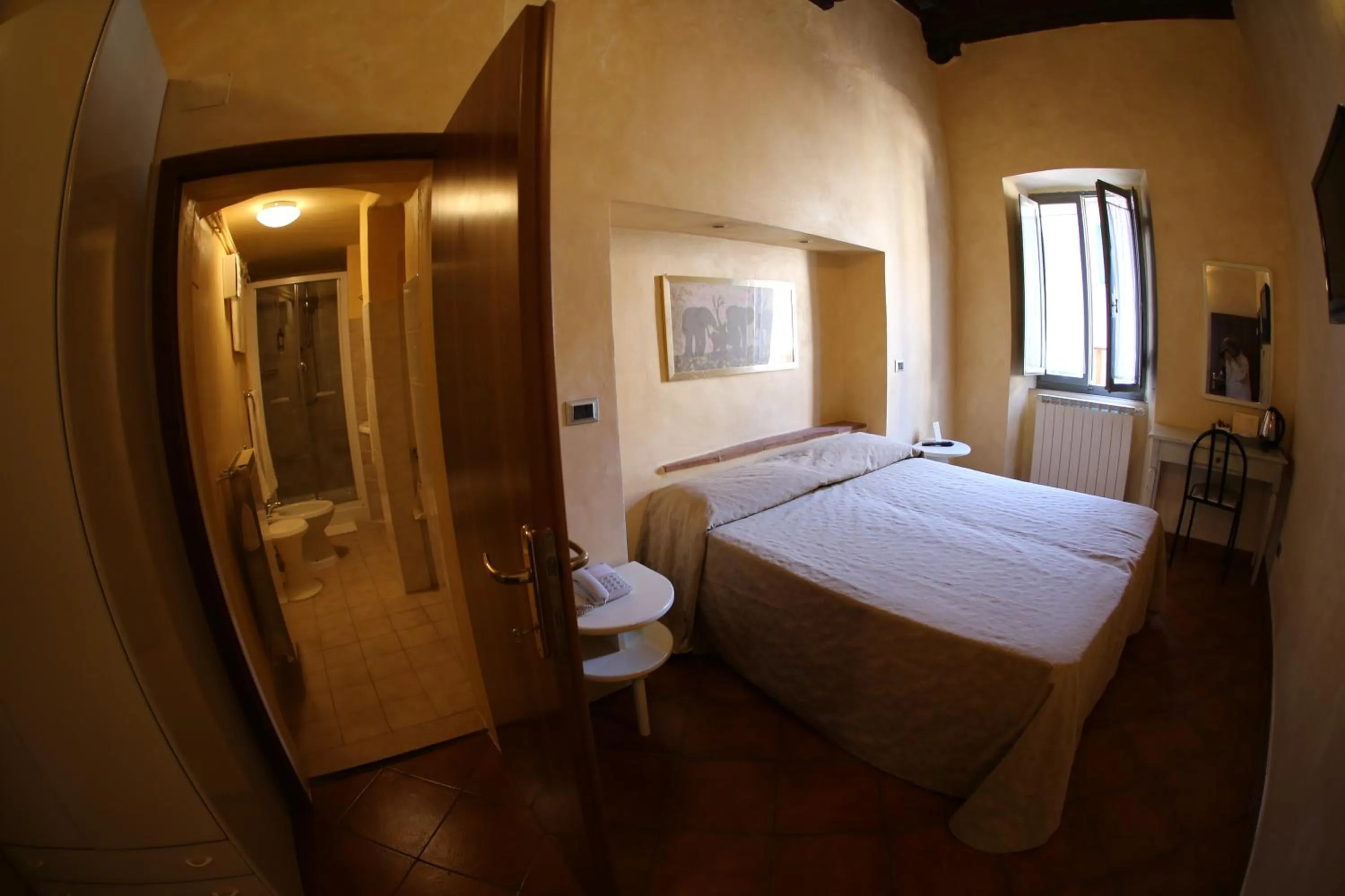 Photo of the whole room, Bed in Hotel Italia Cortona