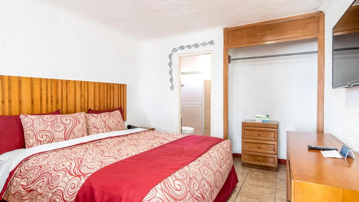 Bed in Puerto Nuevo Baja Hotel & Villas