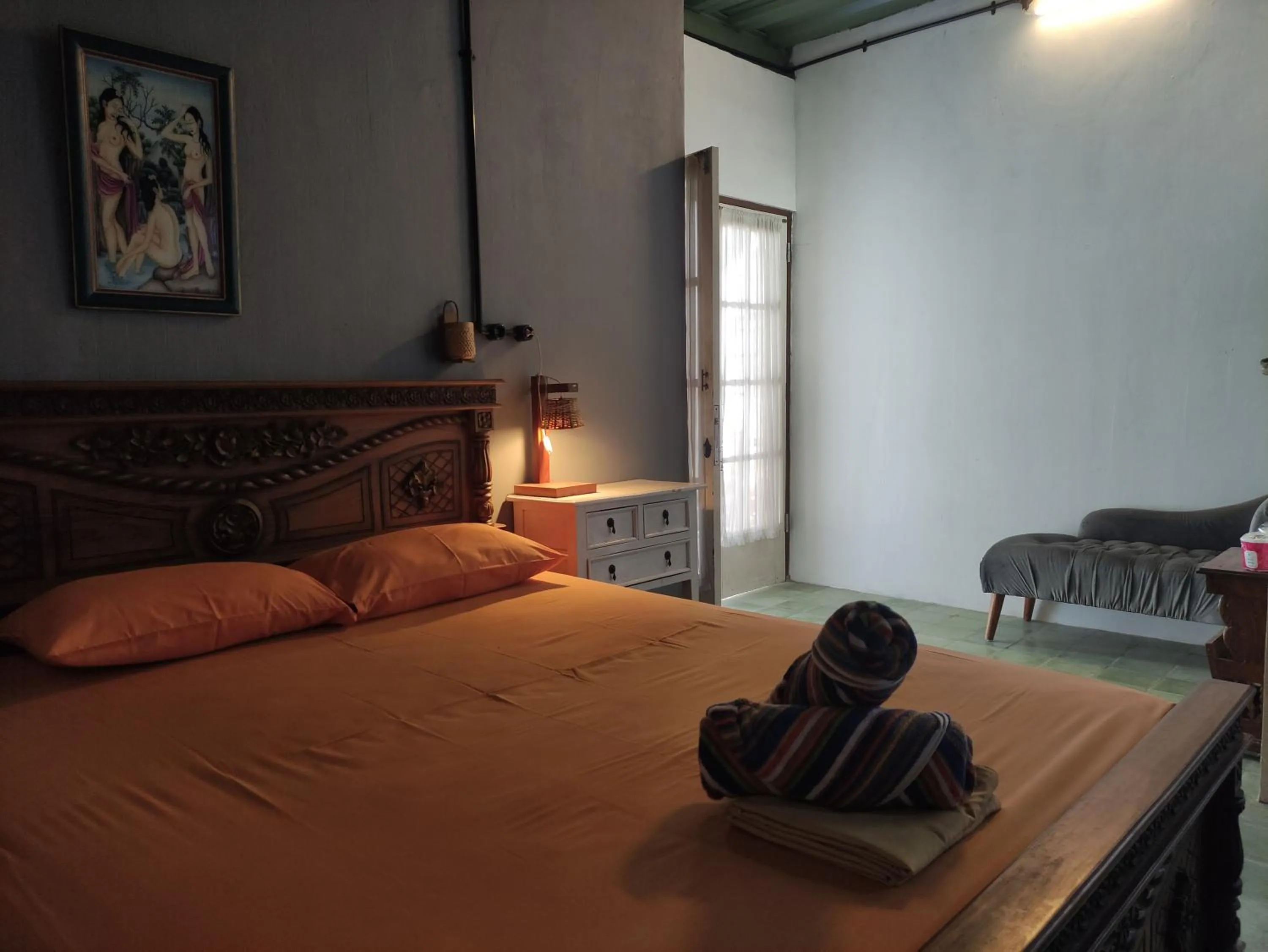 Bed in Arjuna Garden Homestay