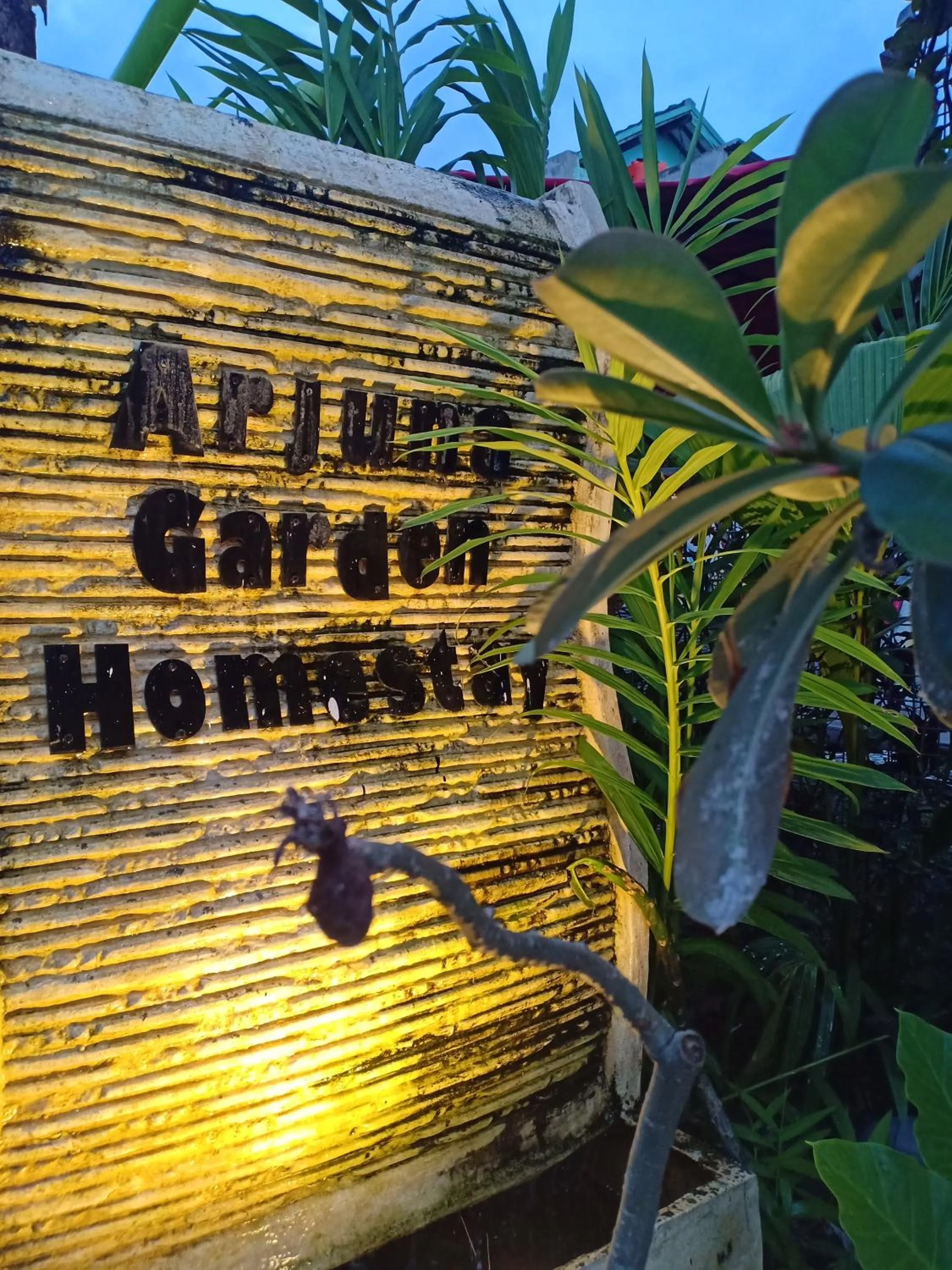Property logo or sign in Arjuna Garden Homestay