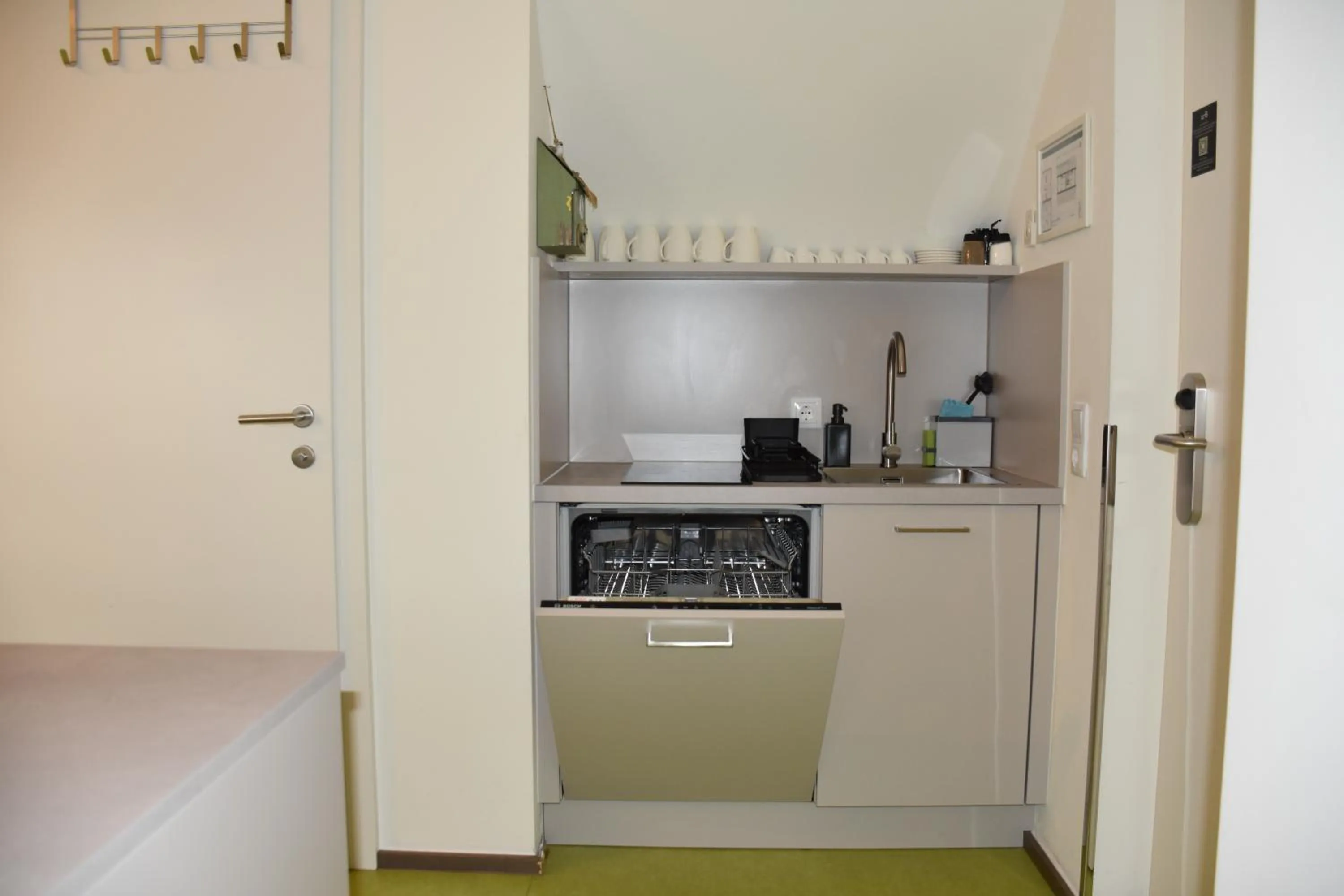 Kitchen or kitchenette in HOMEBOUND APARTMENTS Salzburg City II - contactless check-in