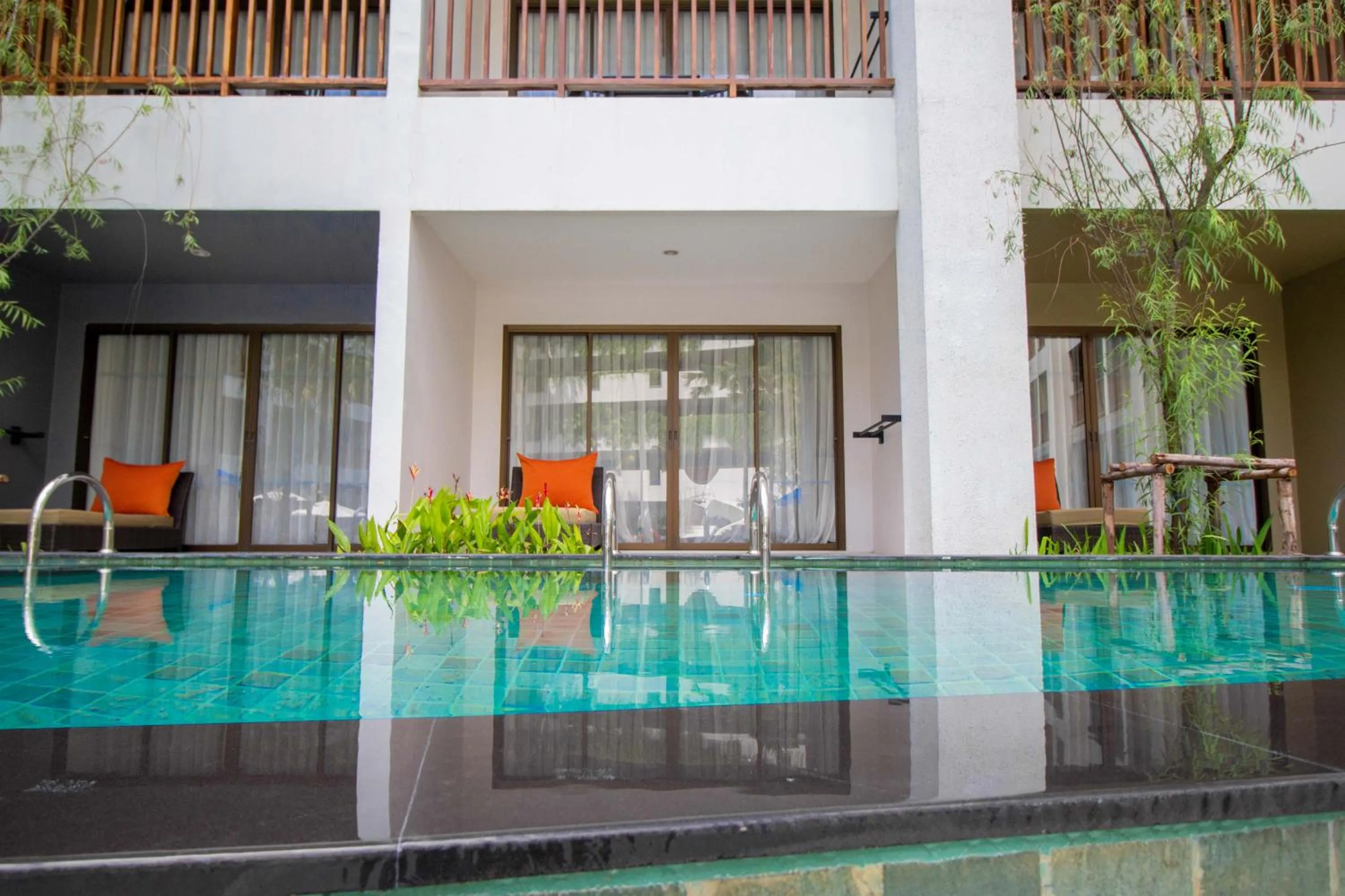 Pool view in Deevana Plaza Phuket - SHA Extra Plus