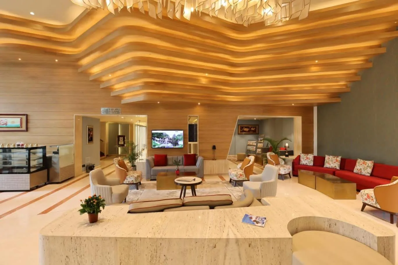Lobby or reception in Citadel Sarovar Portico Bengaluru