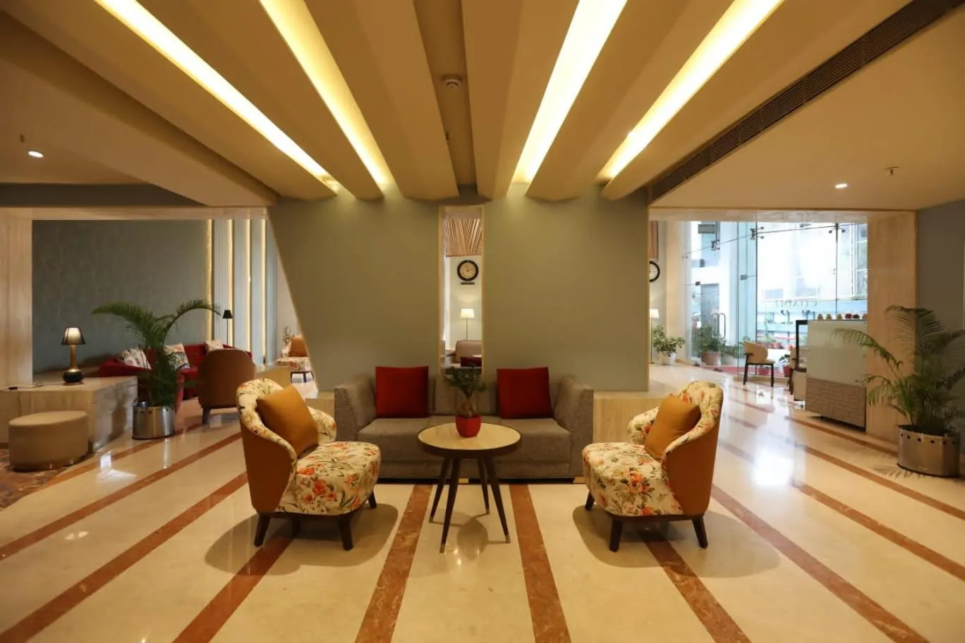 Lobby or reception in Citadel Sarovar Portico Bengaluru