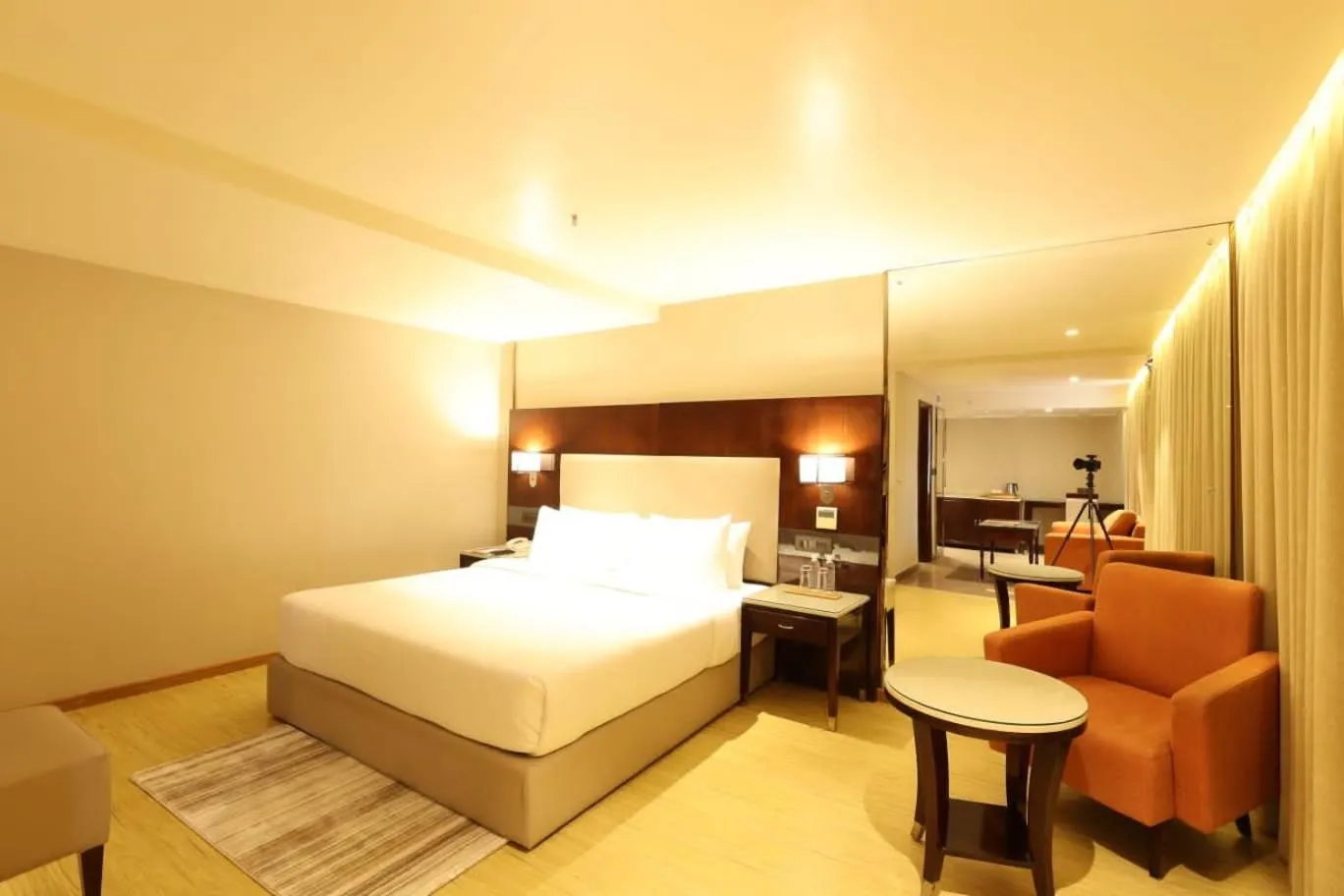 Photo of the whole room, Bed in Citadel Sarovar Portico Bengaluru