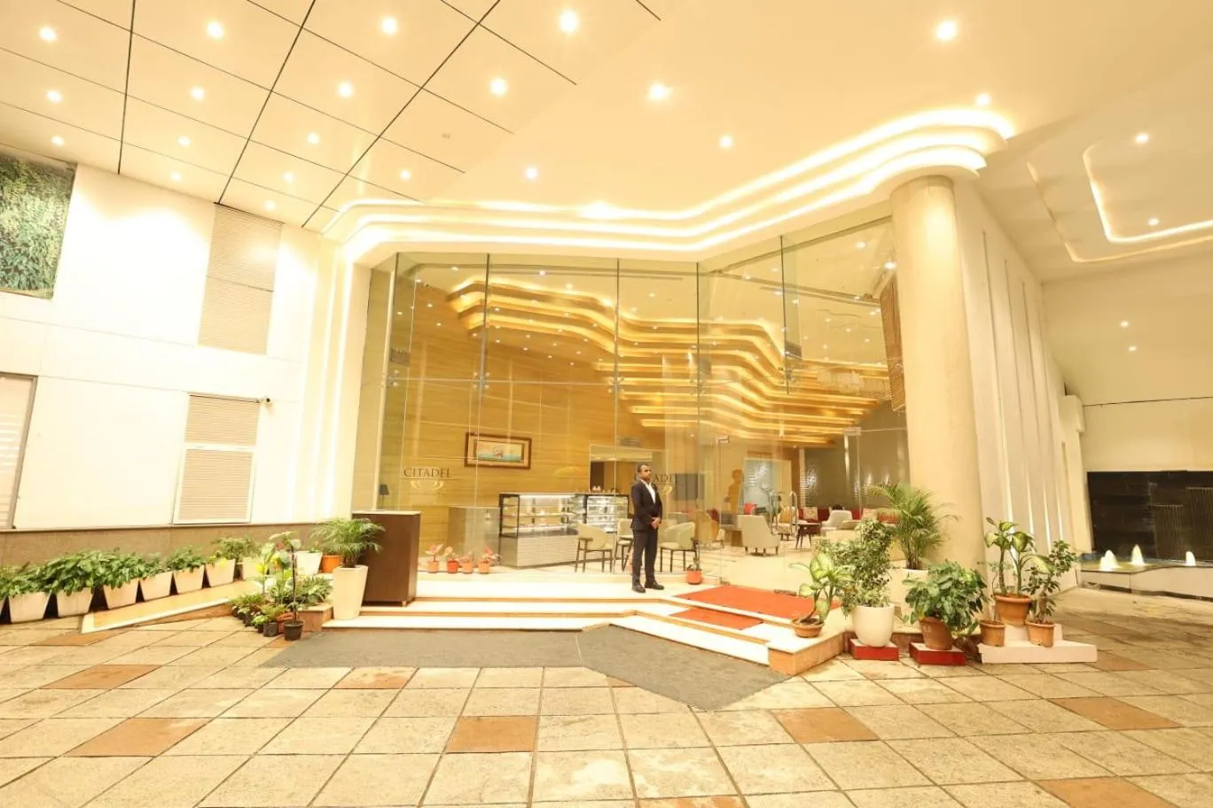 Lobby or reception in Citadel Sarovar Portico Bengaluru