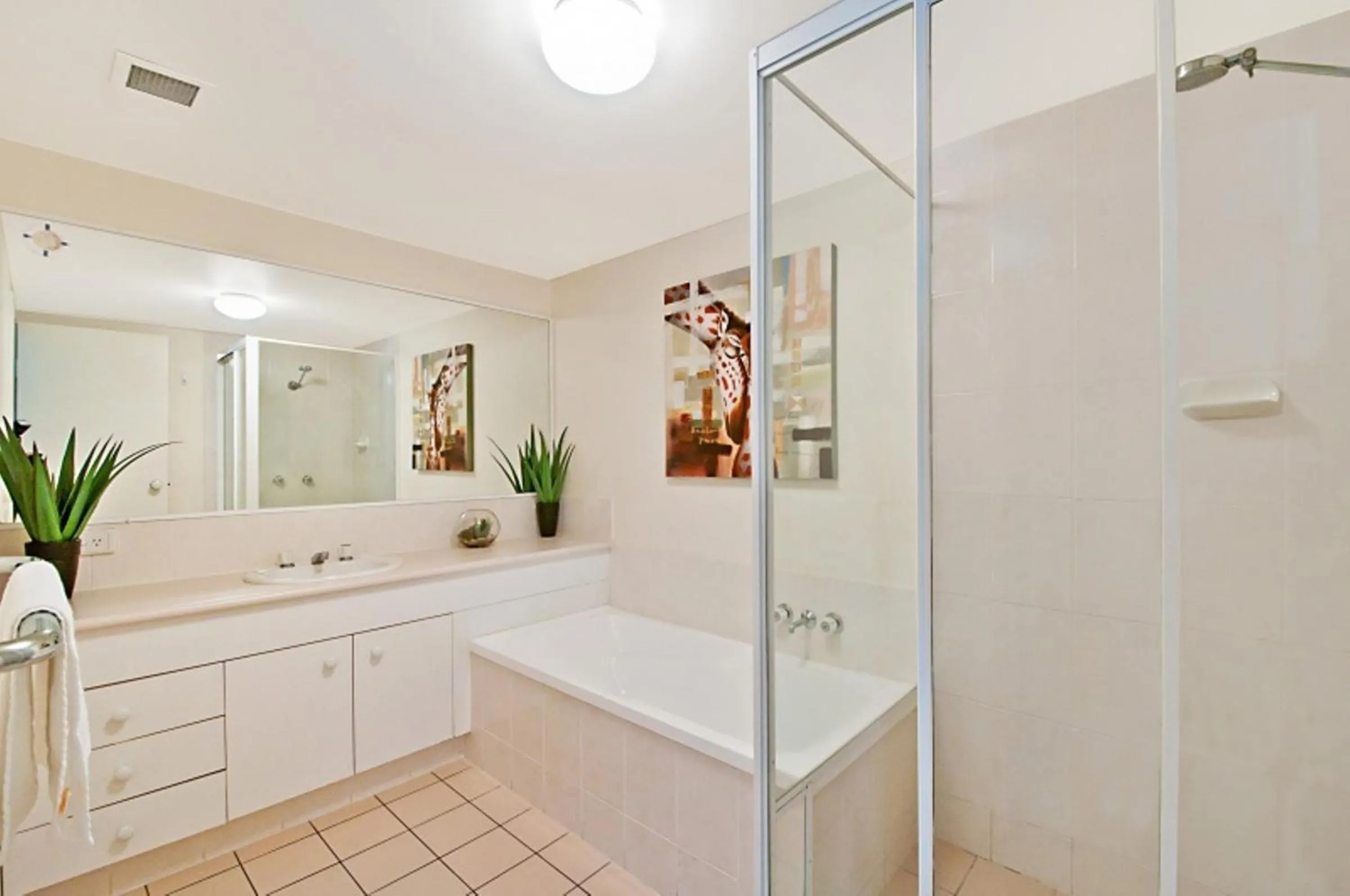 Bathroom in Champelli Palms Apartments