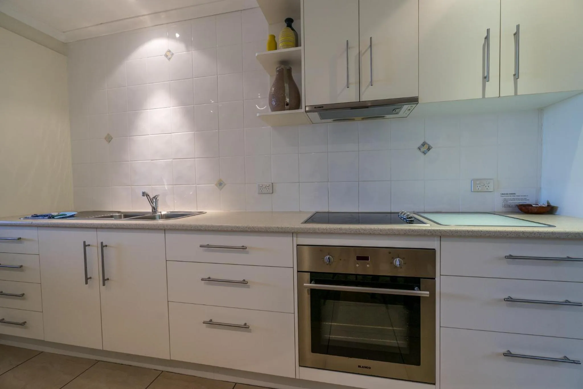 Kitchen or kitchenette in Pandanus Palms Holiday Resort