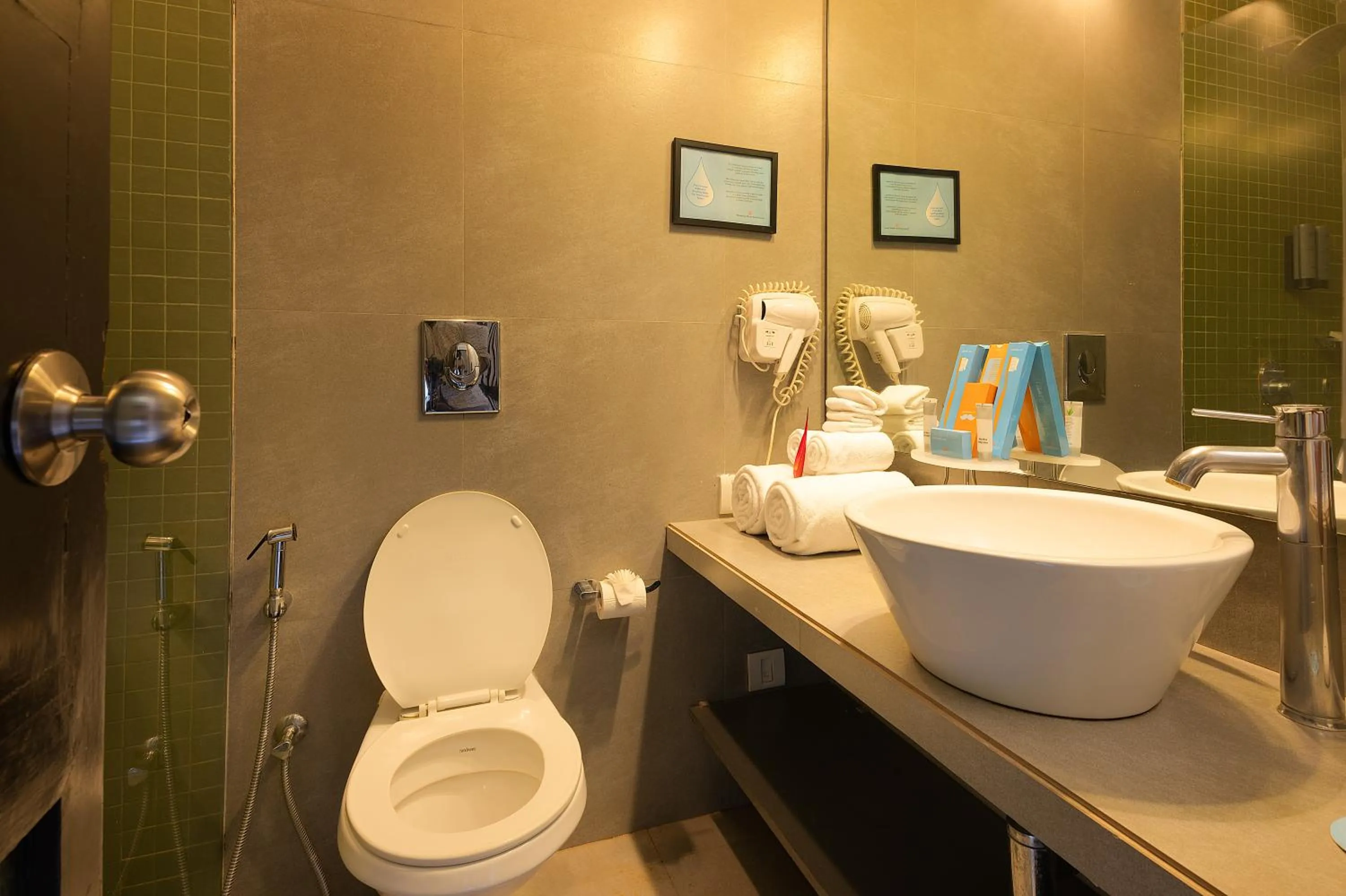 Toilet in Whispering Palms Beach Resort