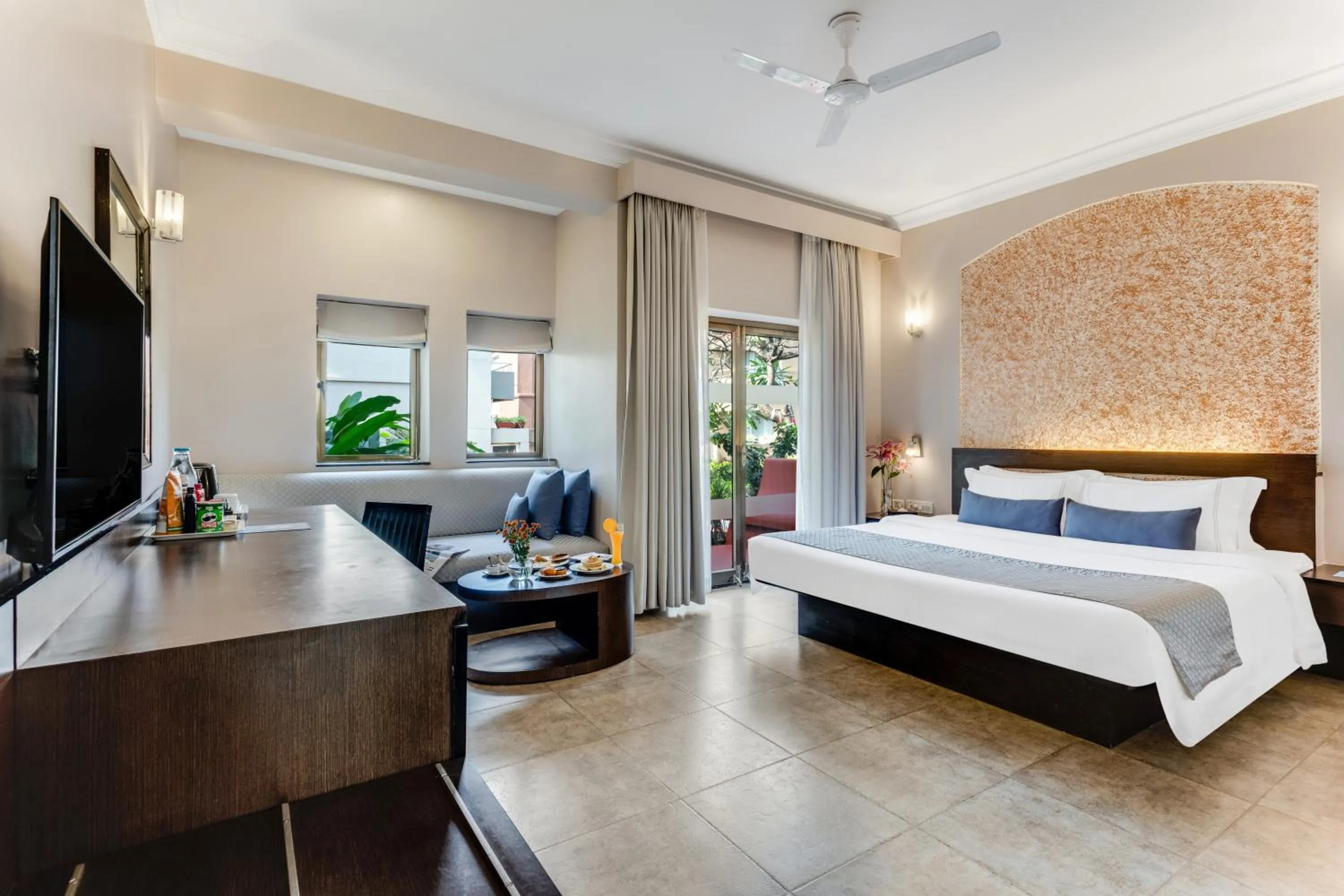 Bed in Whispering Palms Beach Resort