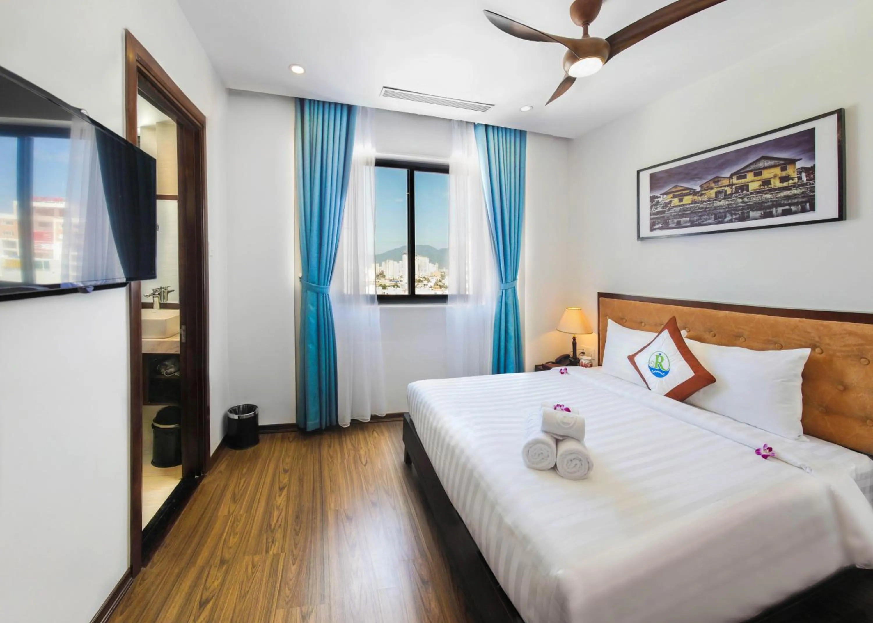 Photo of the whole room, Bed in Ritzy Boutique Hotel Da Nang Beach