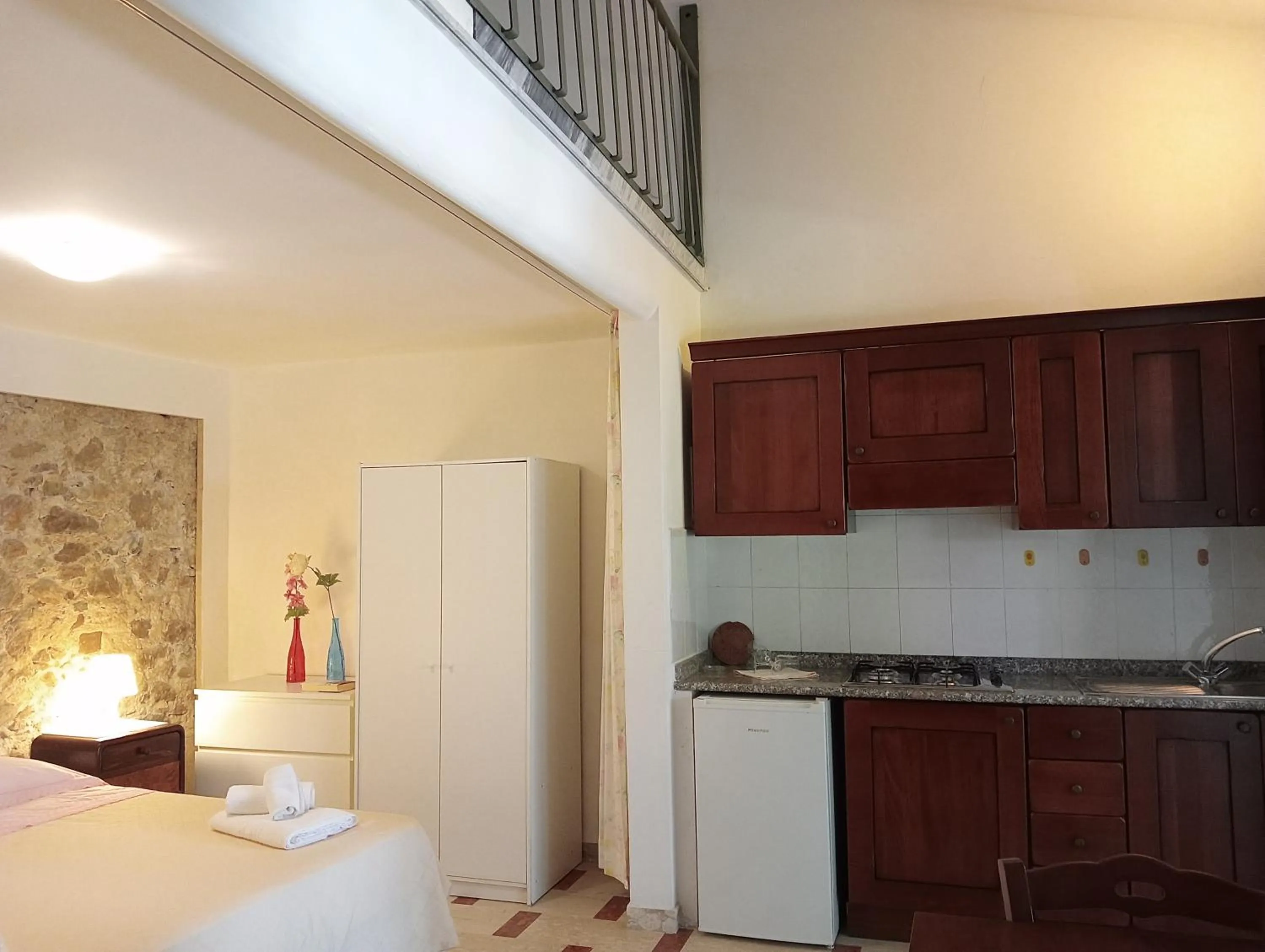 kitchen, Bed in Residenza Giancesare Family Apartments