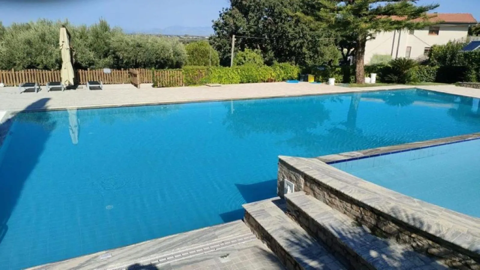 Swimming pool in Residenza Giancesare Family Apartments