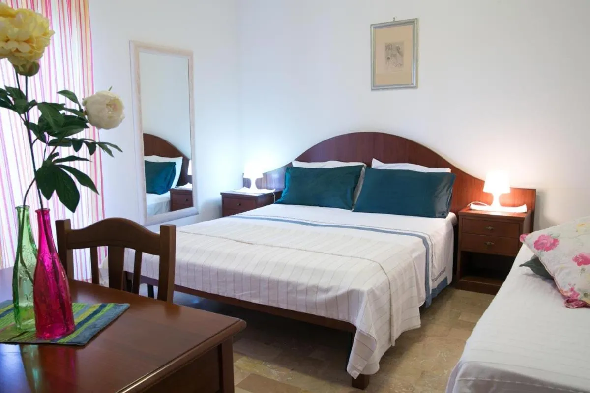 Bed in Residenza Giancesare Family Apartments