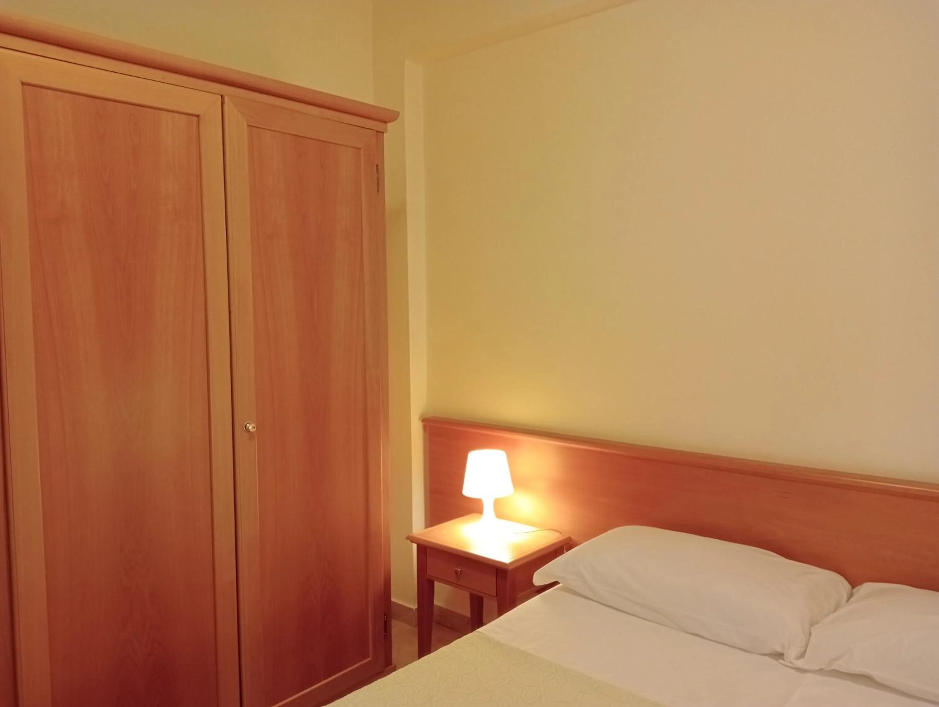 Bedroom, Bed in Residenza Giancesare Family Apartments