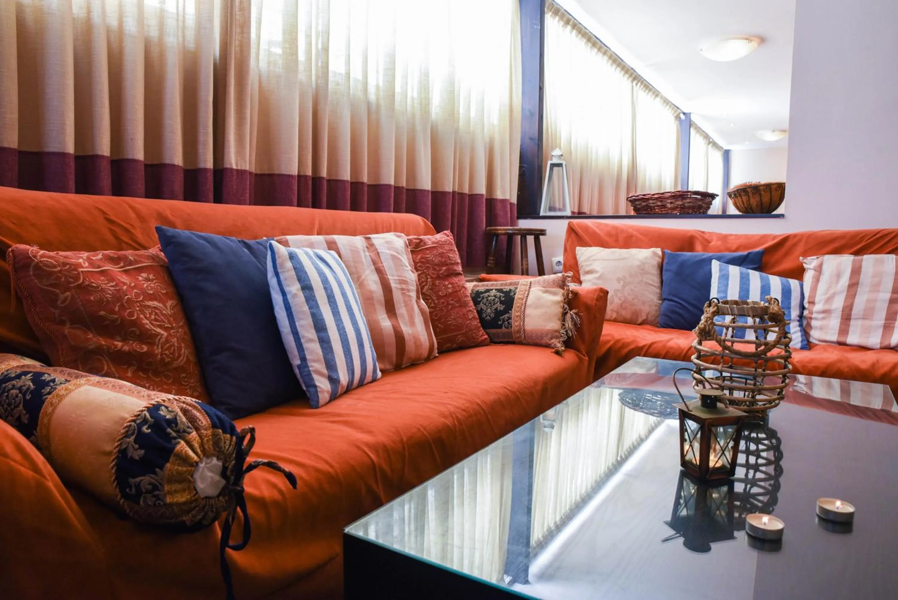 Communal lounge/ TV room, Seating Area in Amaryllis Hotel