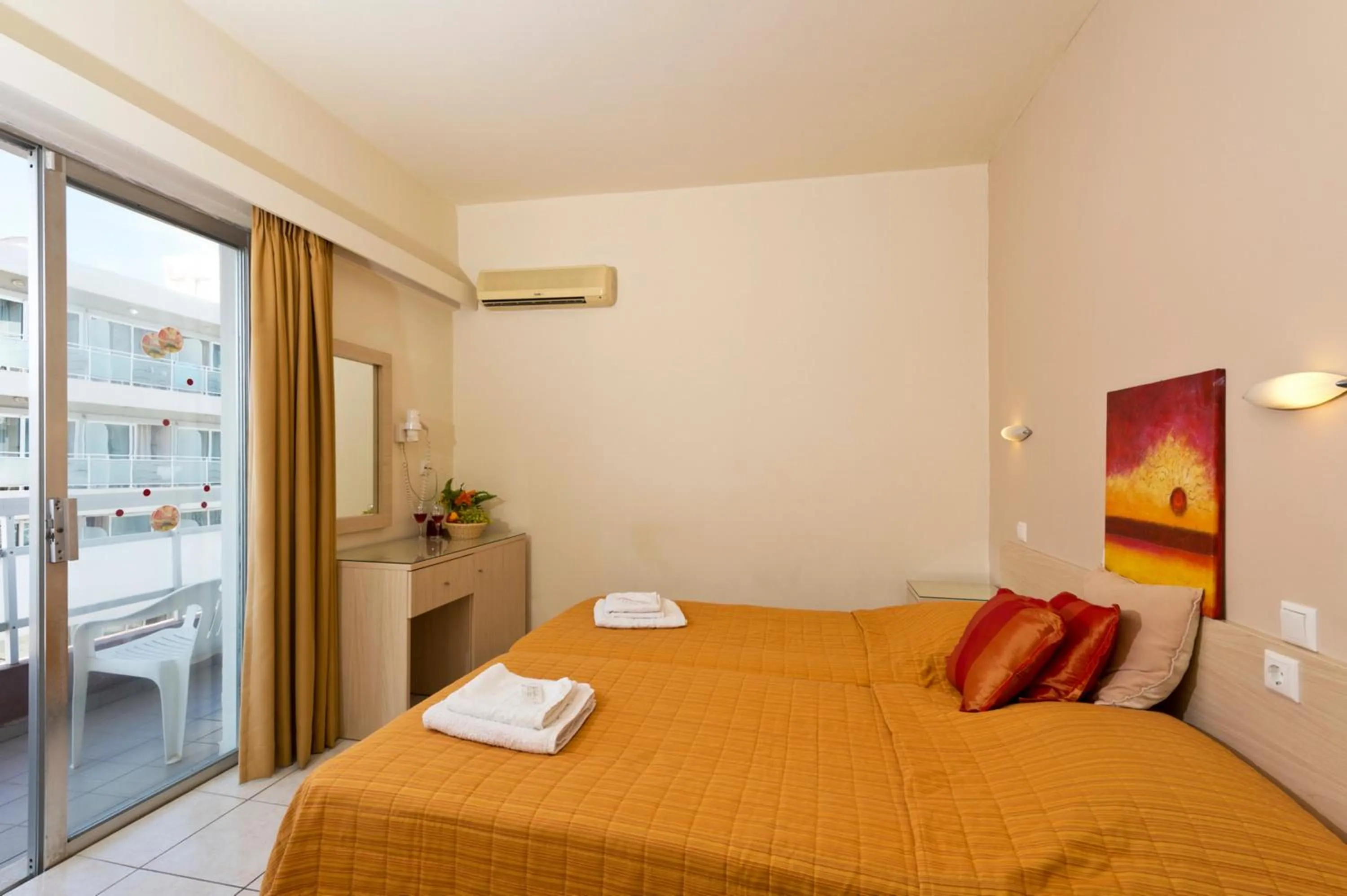 Bedroom in Amaryllis Hotel