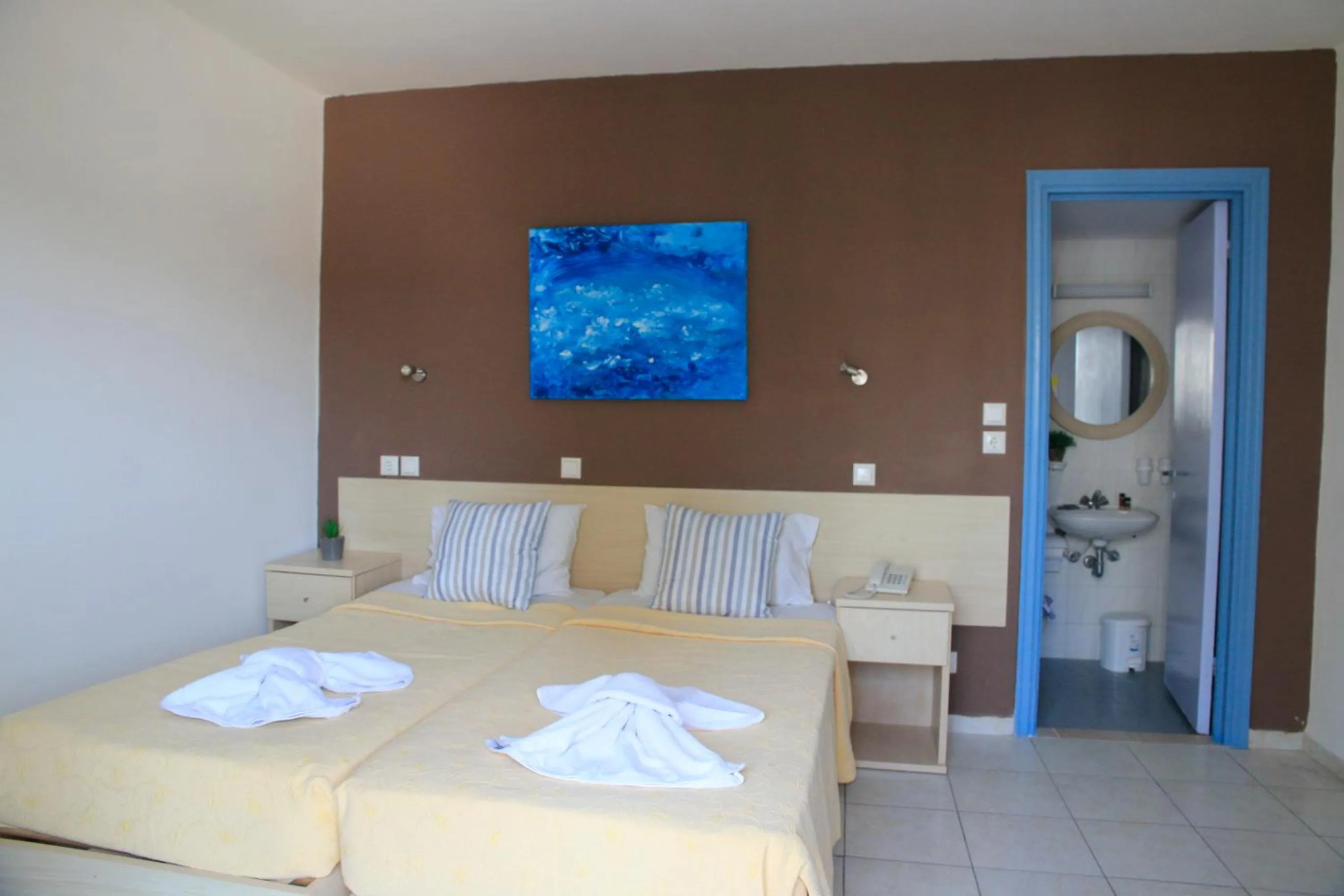 Bedroom in Amaryllis Hotel