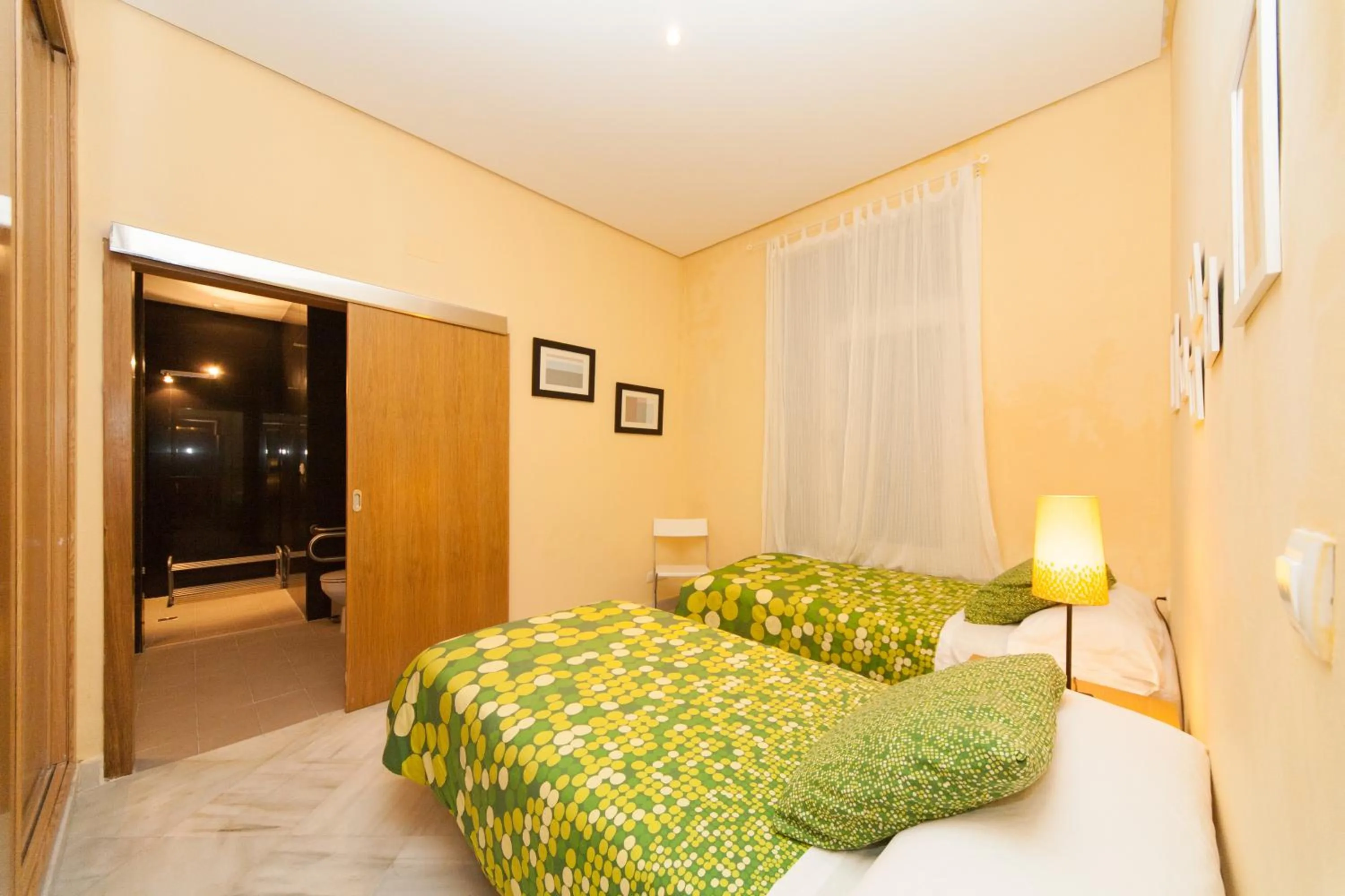 Bed in La Casa del Conde de Gelves Apartments