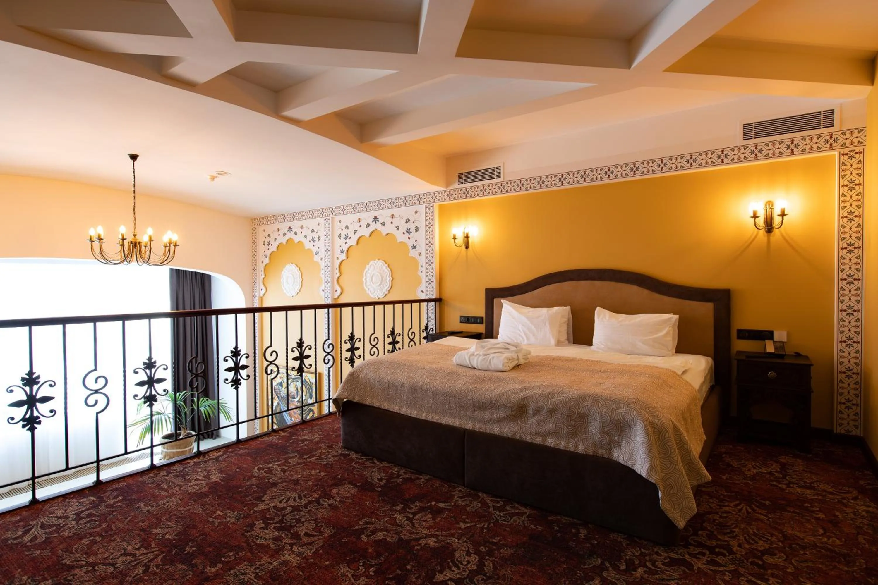 Bed in Tsunami Spa Hotel