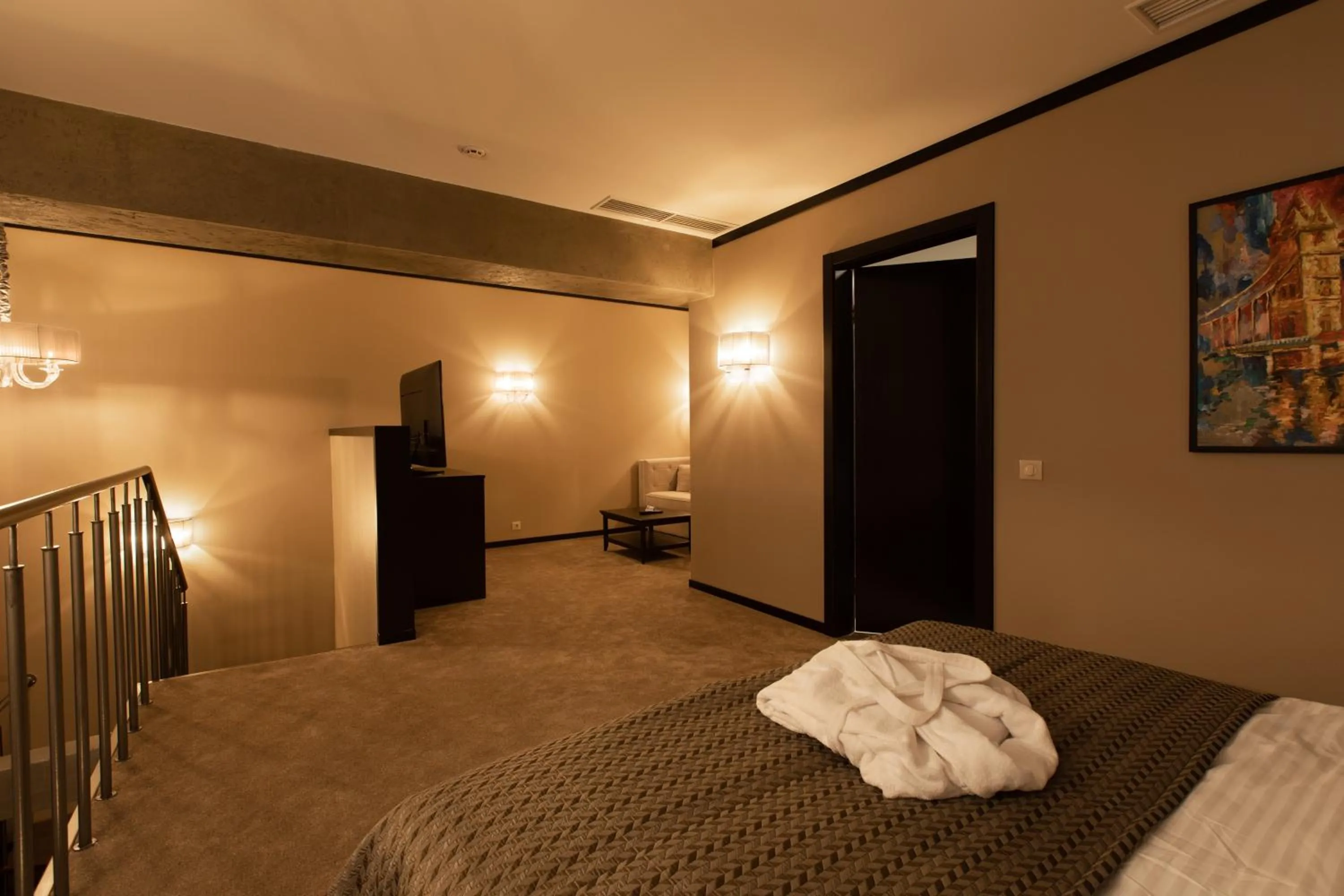 Bed in Tsunami Spa Hotel