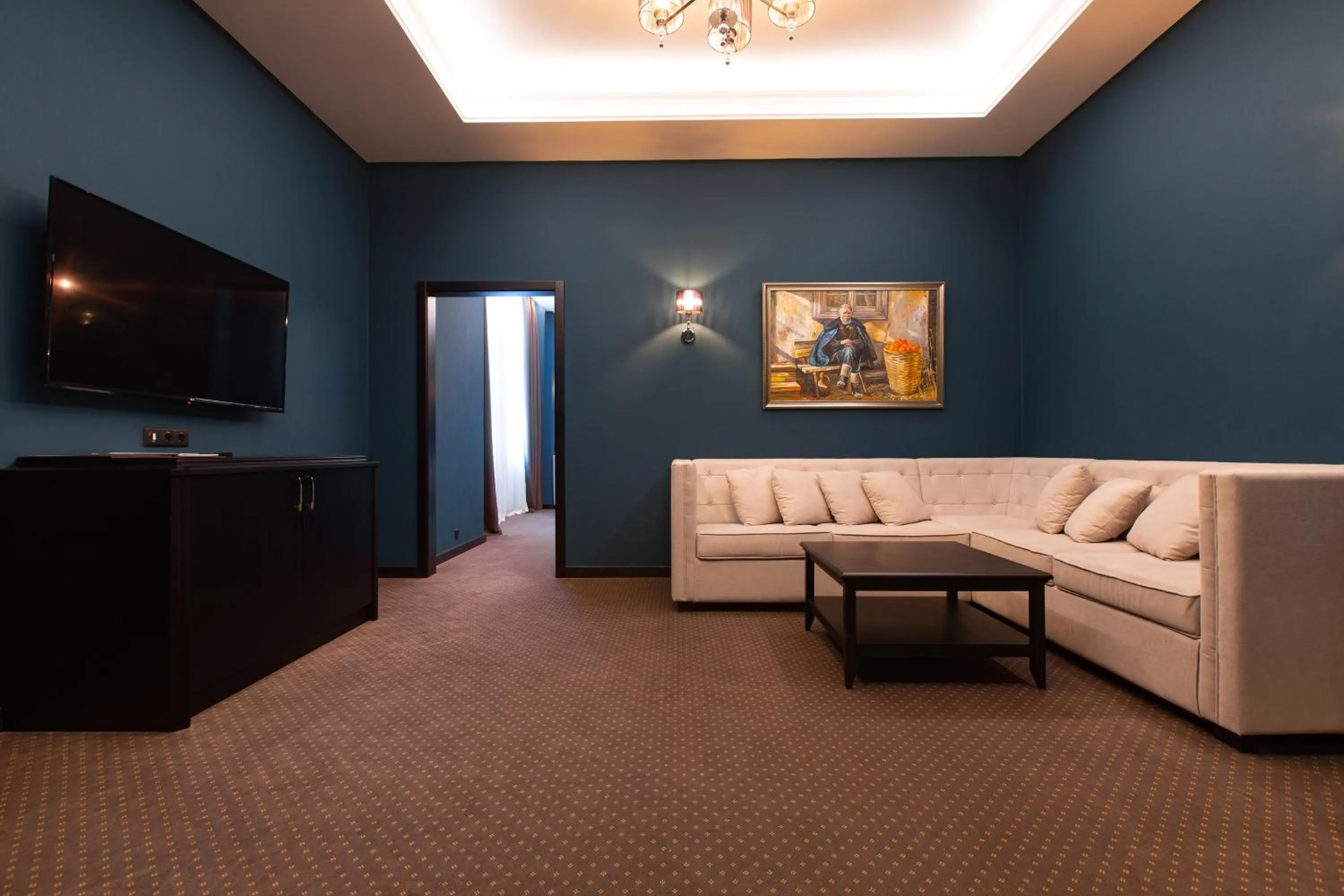 Communal lounge/ TV room in Tsunami Spa Hotel