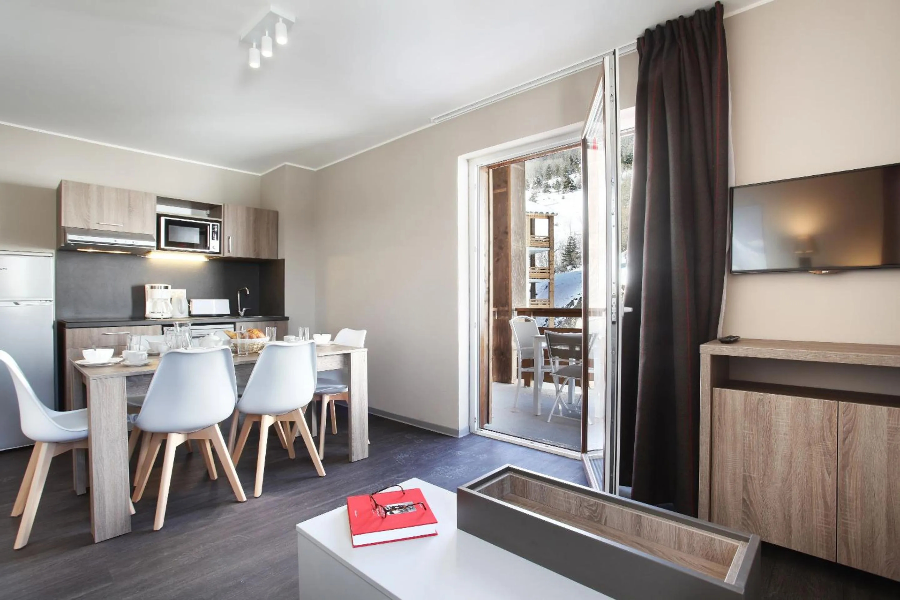 Kitchen or kitchenette in Résidence Odalys Le Village de Praroustan