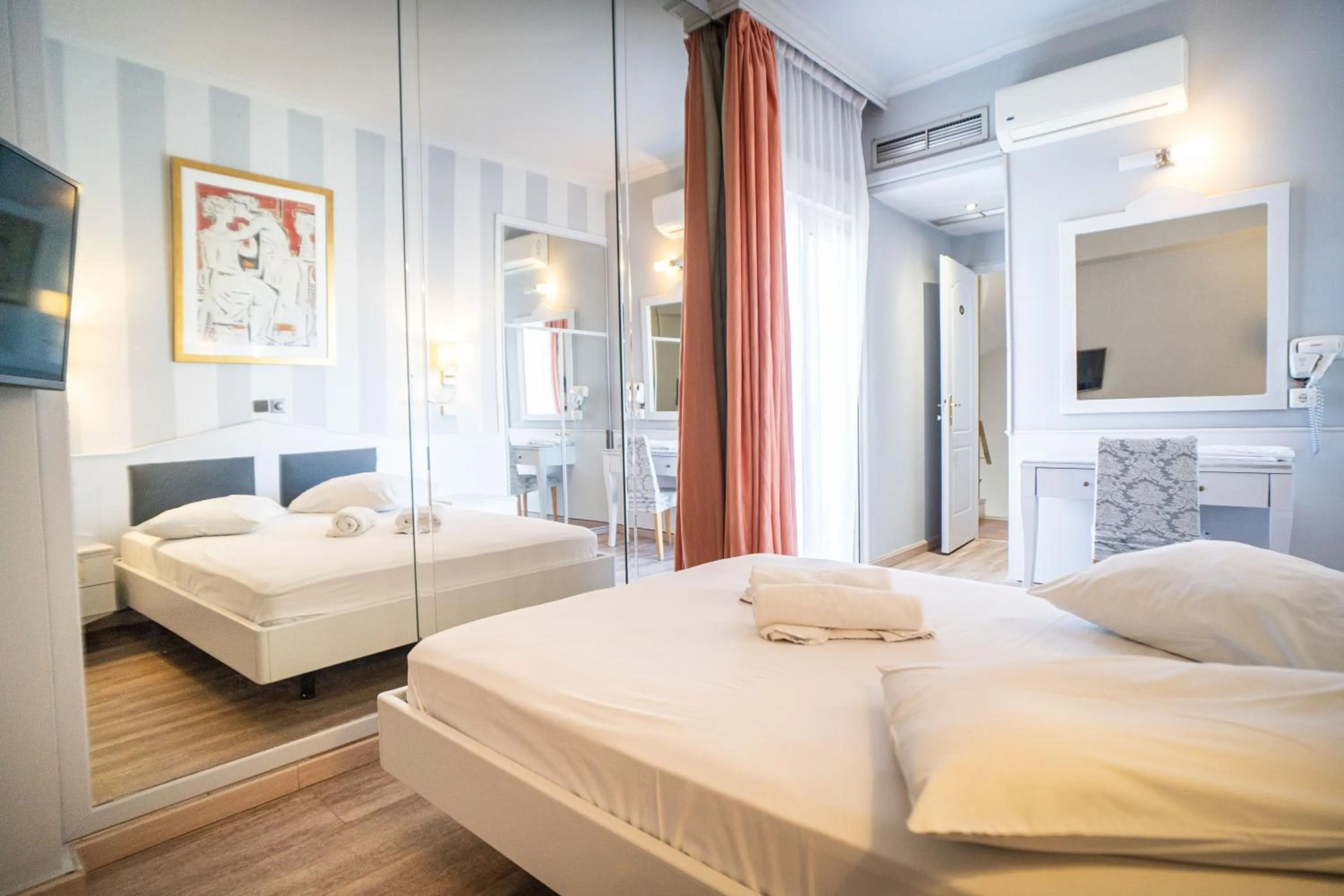 Bed in Eva Hotel Piraeus