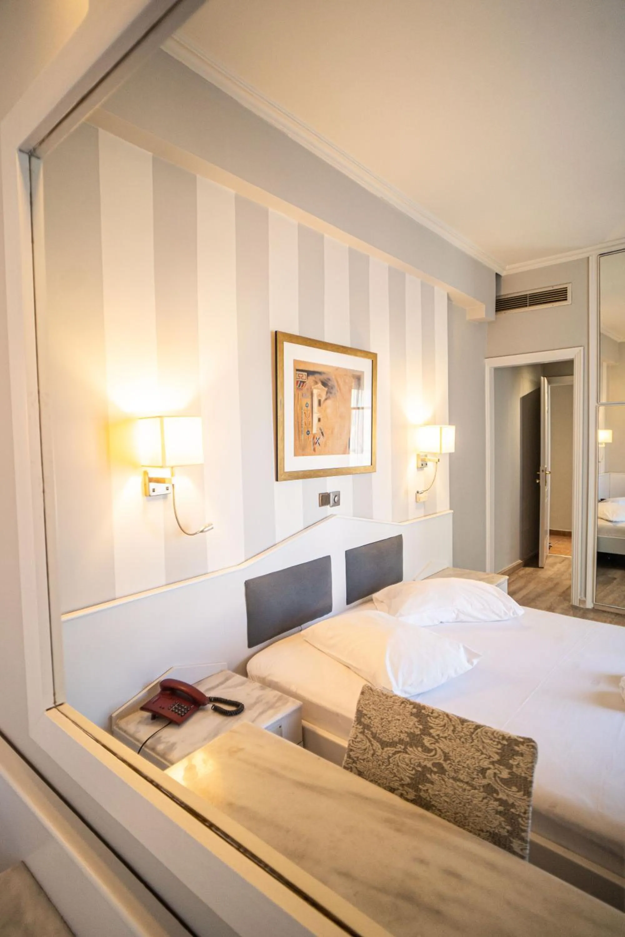 Bed in Eva Hotel Piraeus