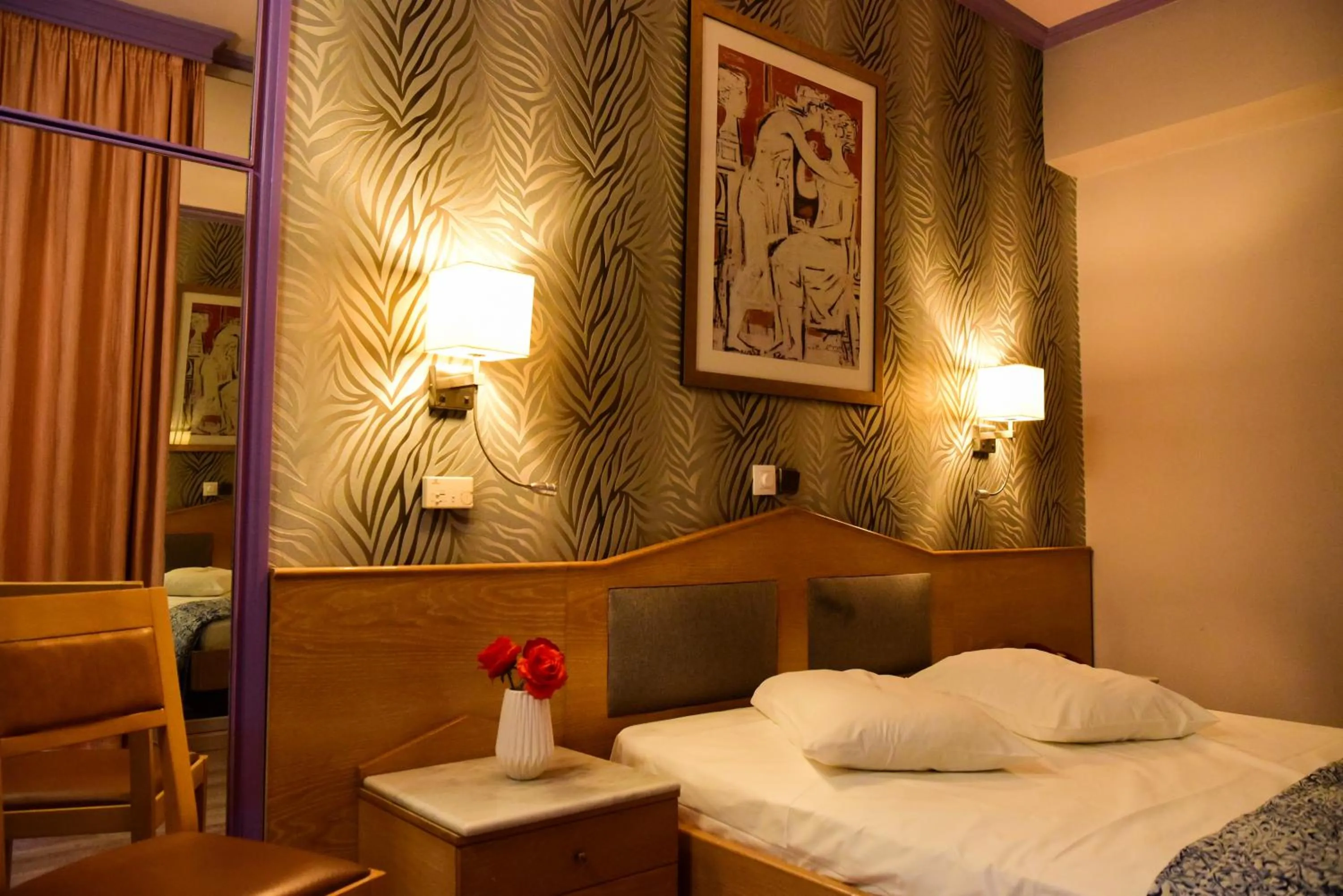 Bed in Eva Hotel Piraeus