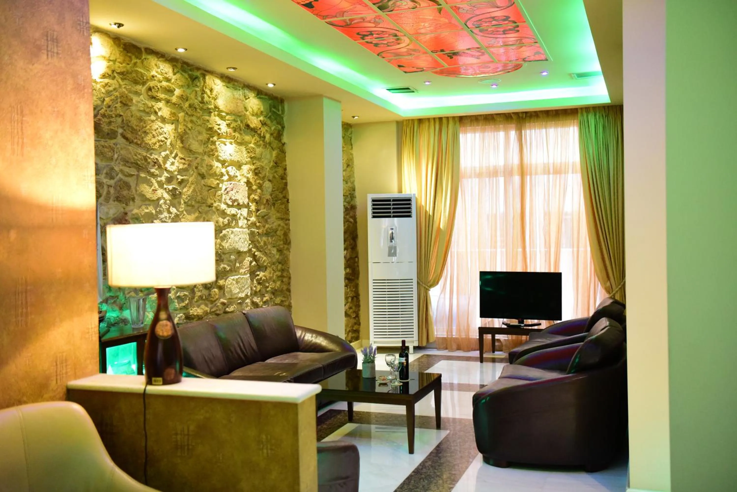 Communal lounge/ TV room in Eva Hotel Piraeus