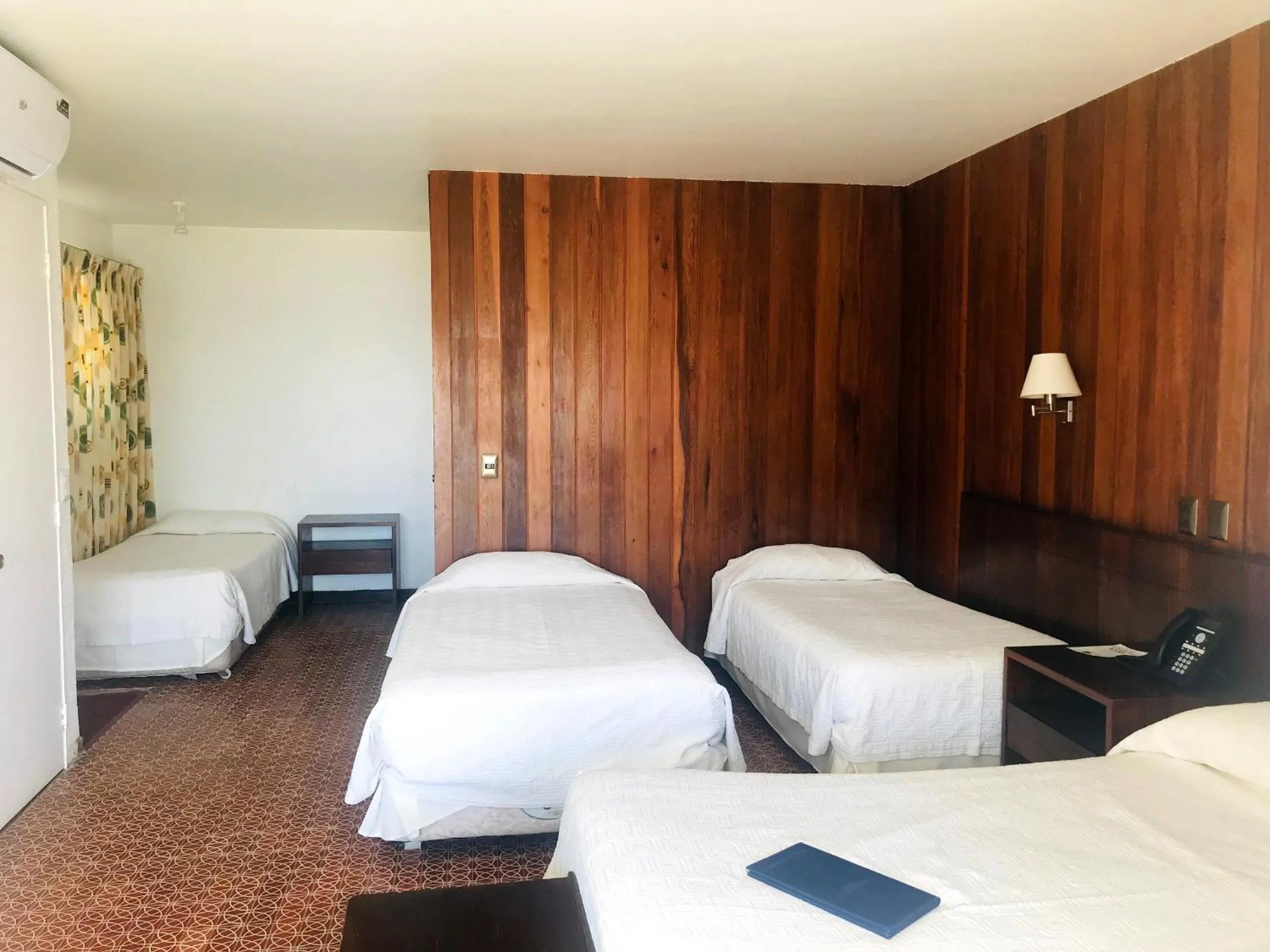 Bed in Panamericana Hotel Arica