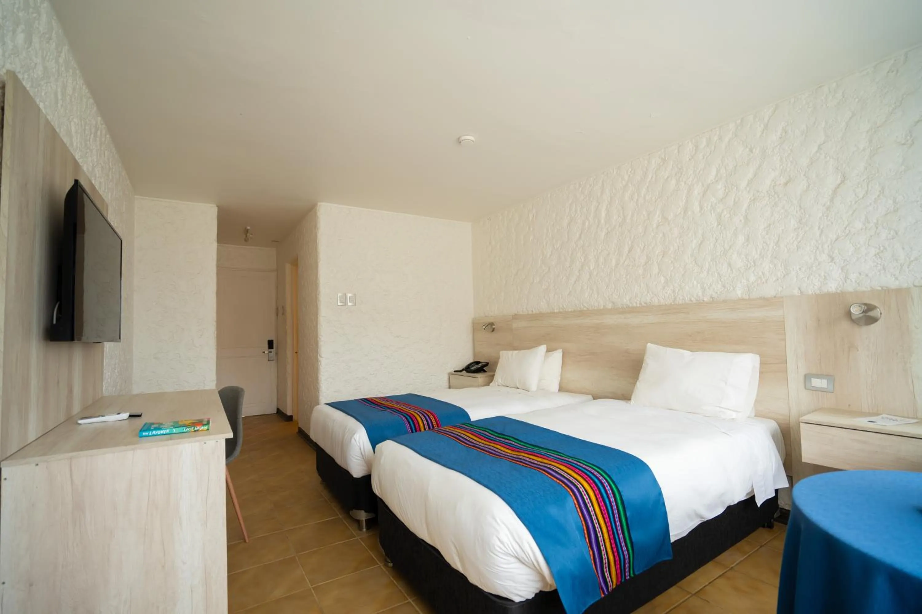 Bed in Panamericana Hotel Arica