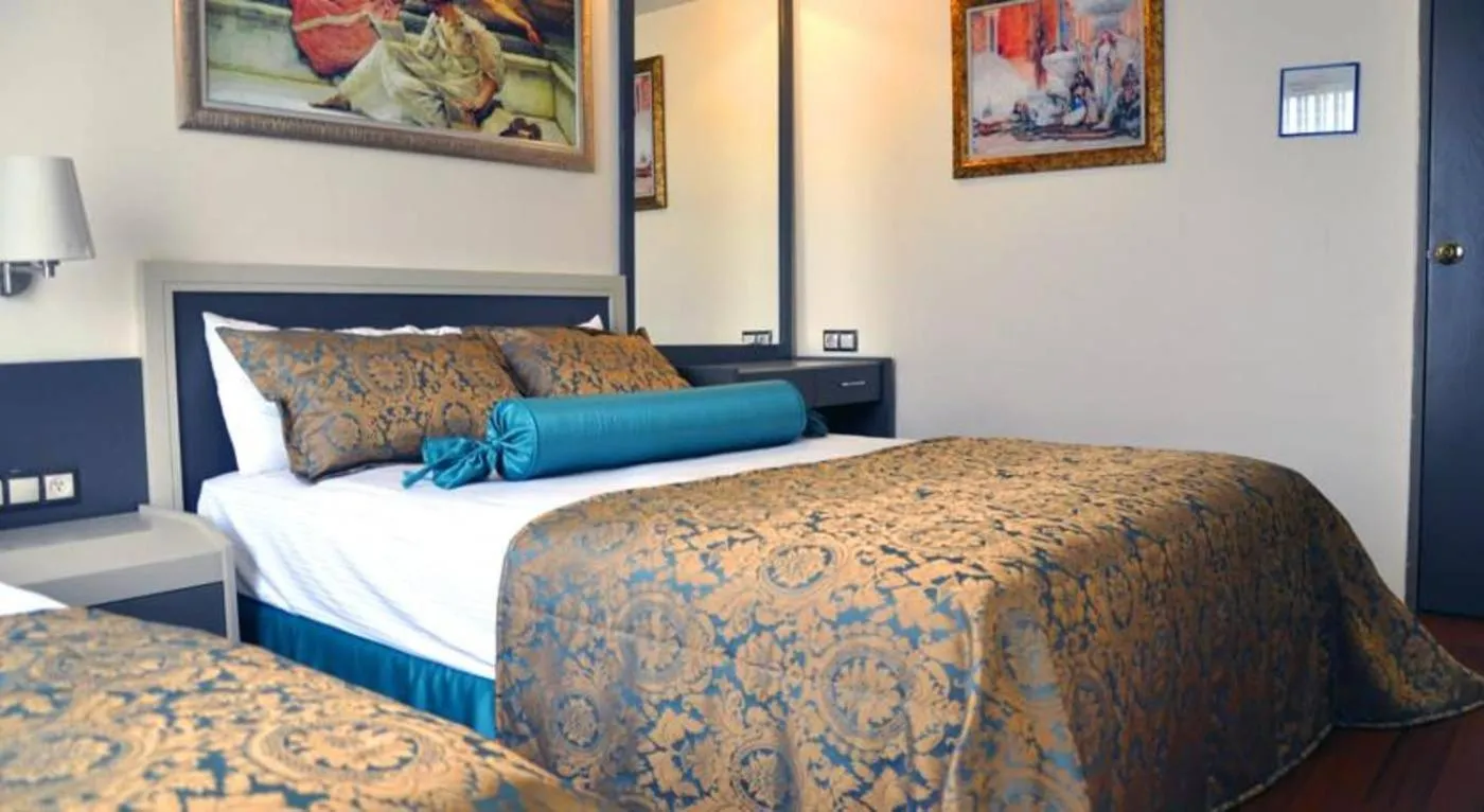 Bed in Hotel Ambrosia