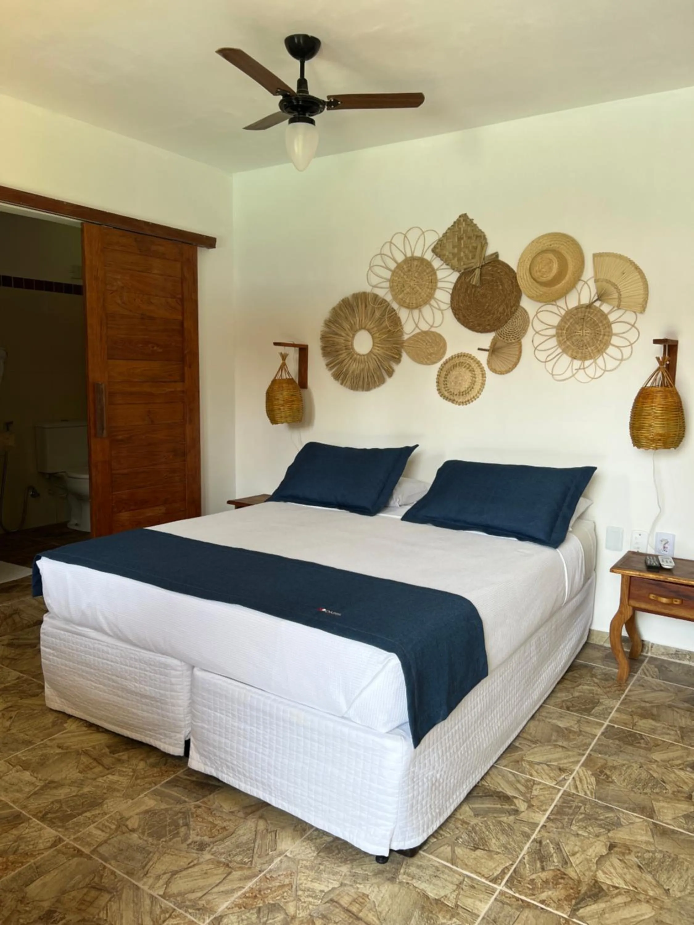 Bed in Pousada Oasis