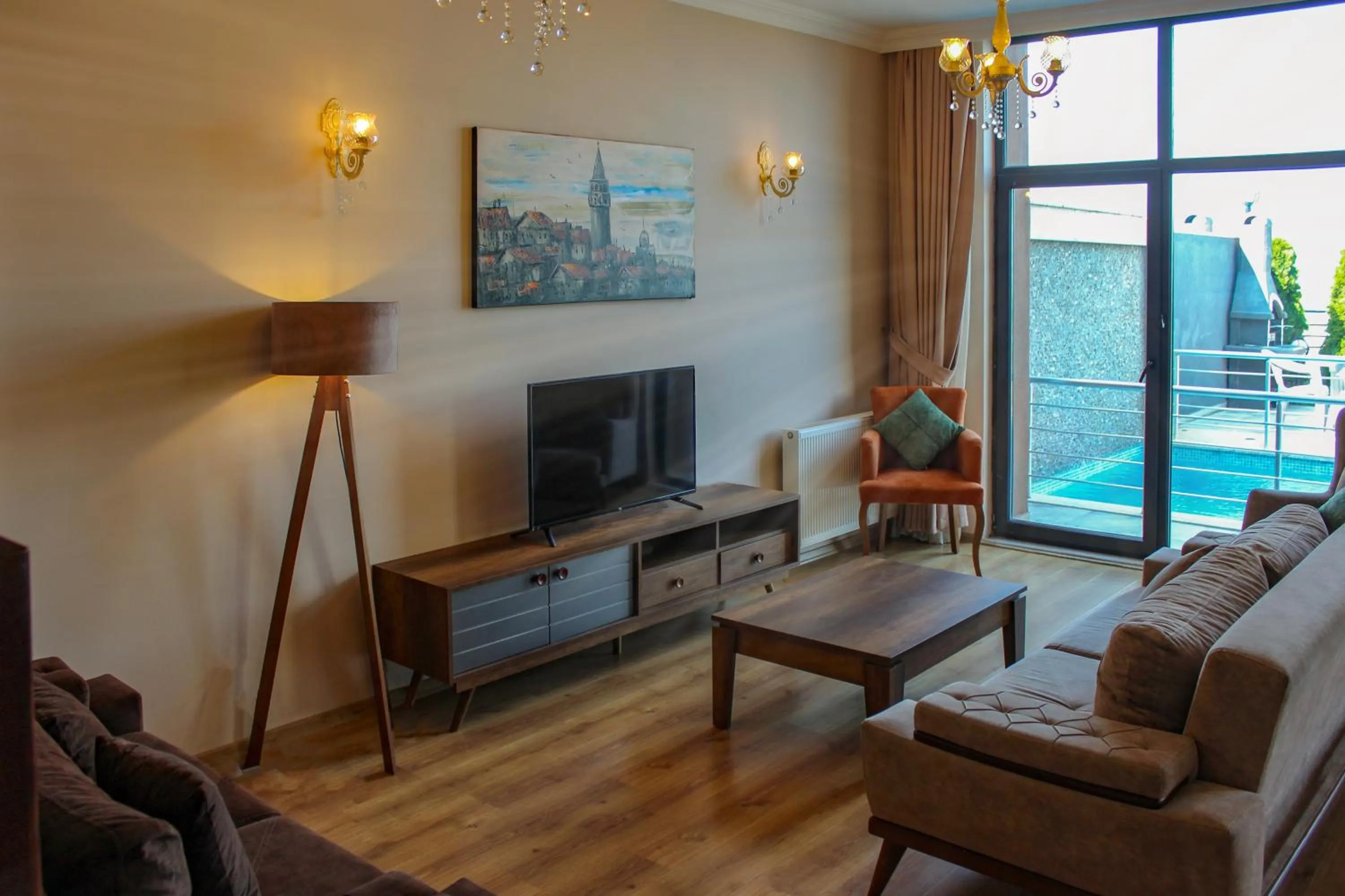 Communal lounge/ TV room in Sawsana Villalari