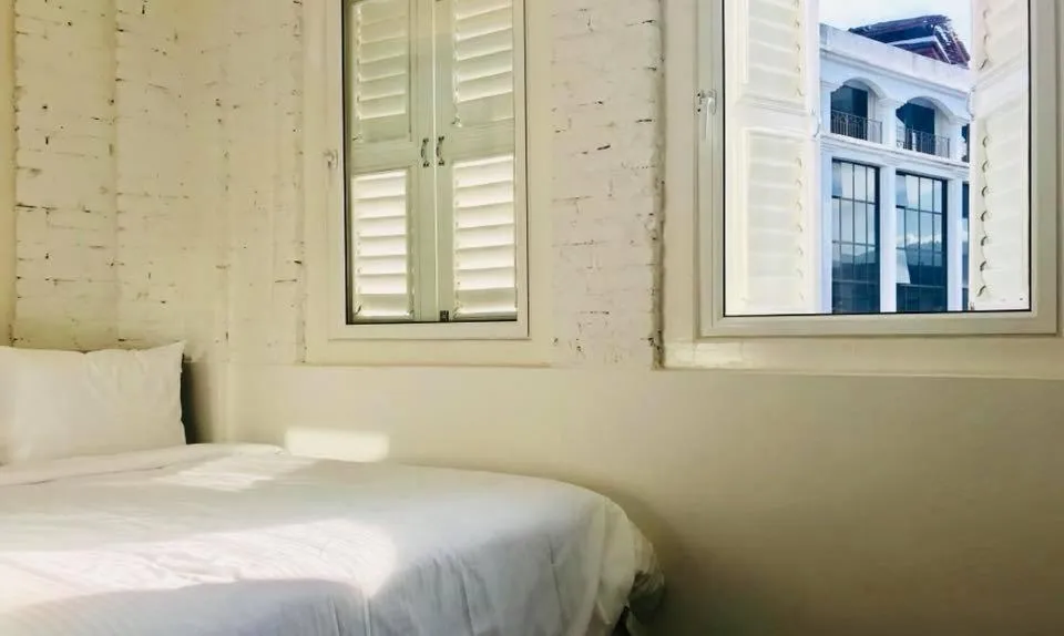 Bed in The Southern Boutique Hotel