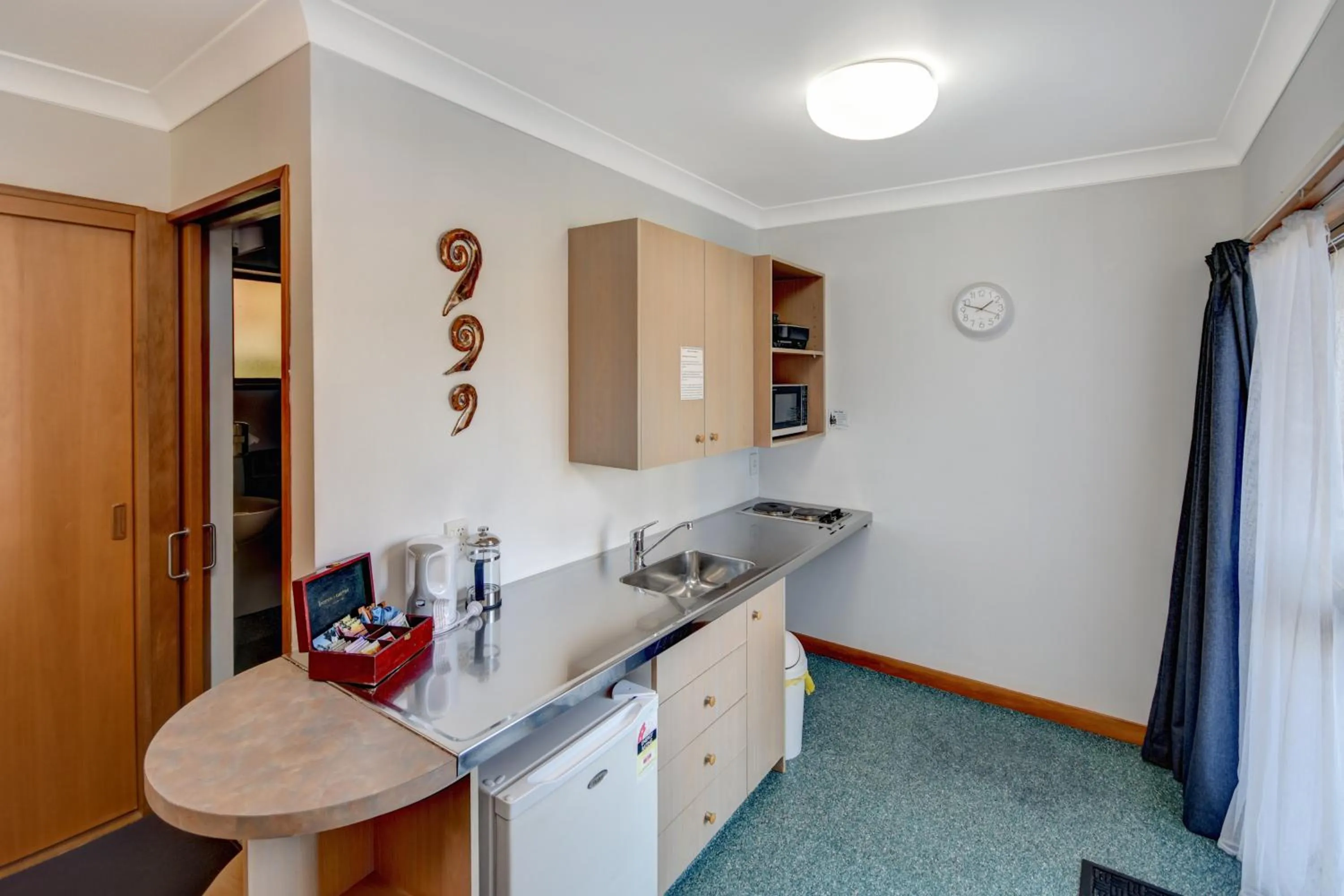 Kitchen or kitchenette in Garden Motel