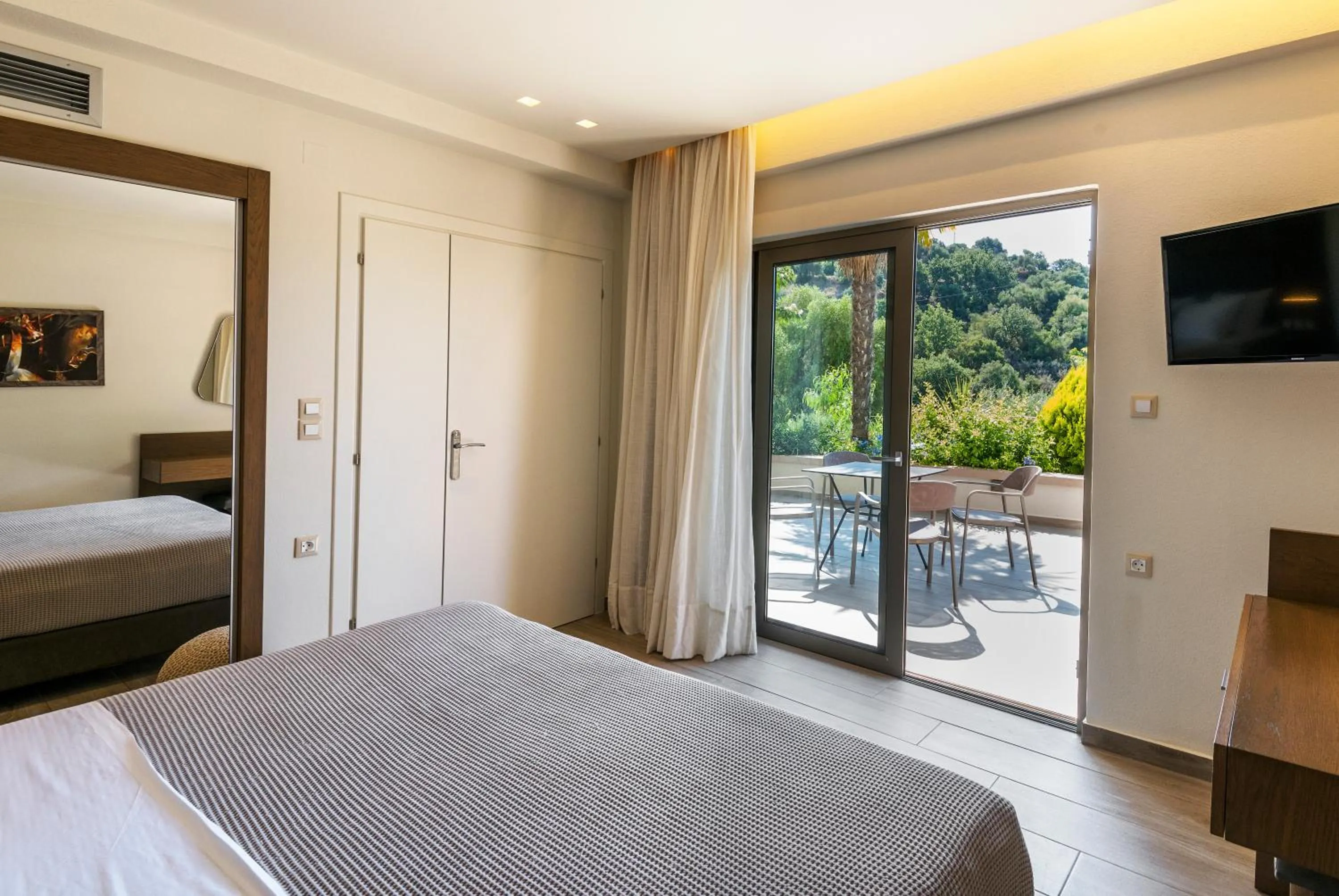 Bed in Prima Vista Beachfront Boutique Hotel