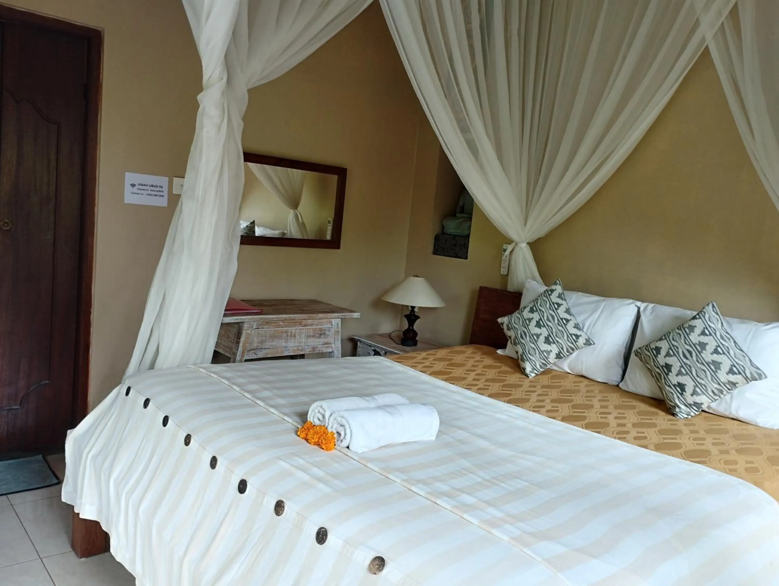 Bed in Umah Ubud Guest House