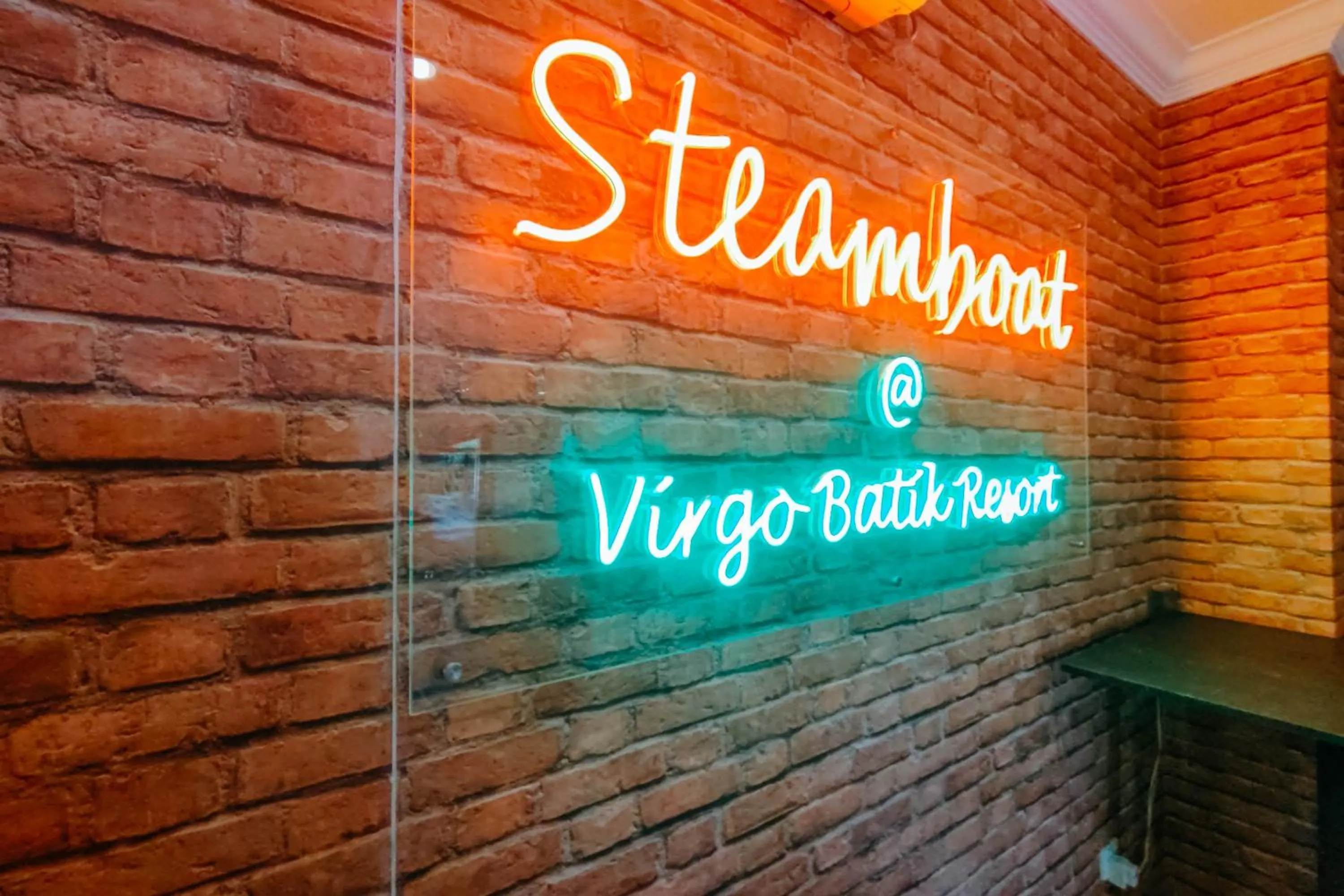 Property logo or sign in Virgo Batik Resort Teluk Batik Lumut