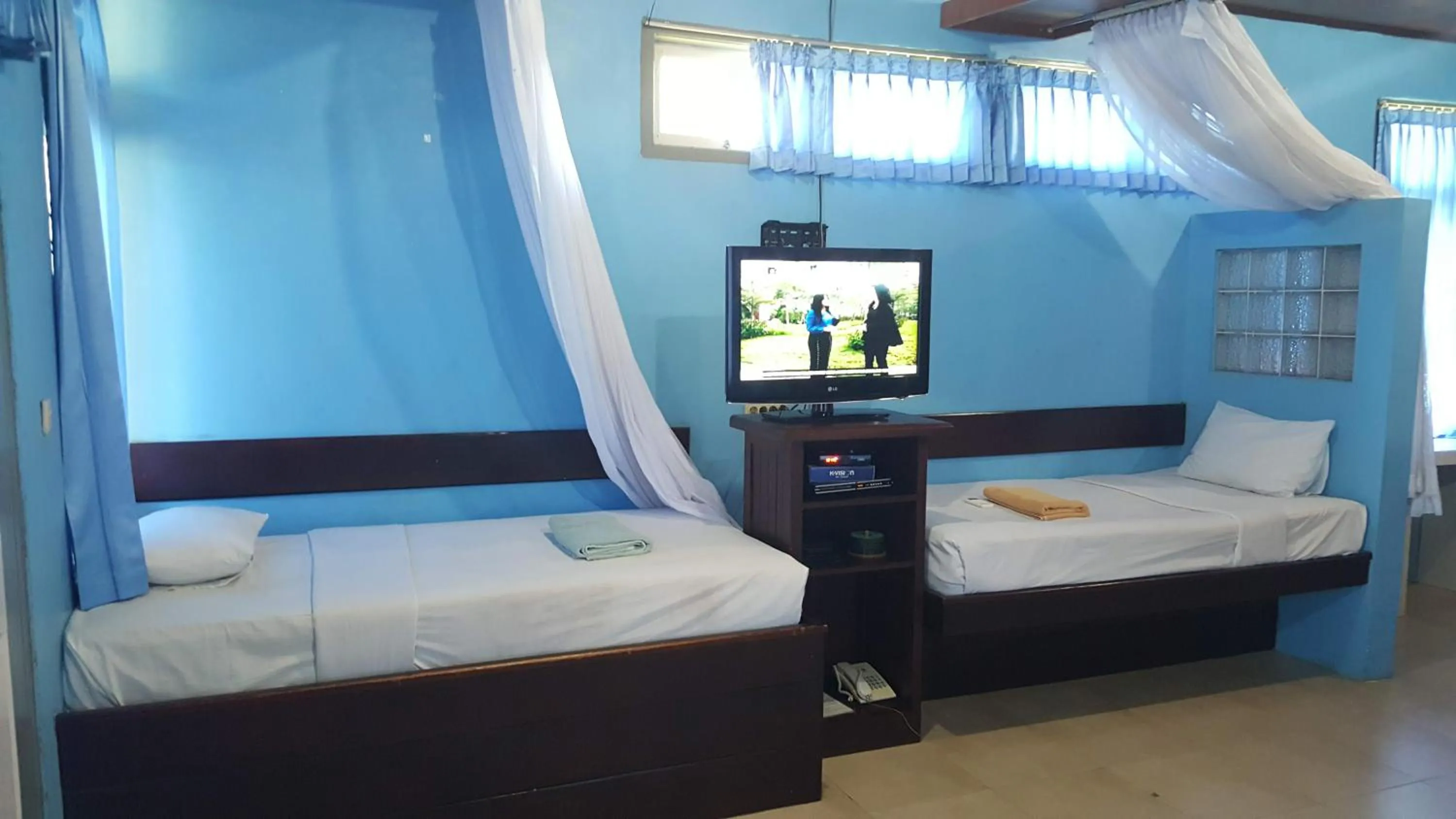 Bed in Aman Gati Hotel Lakey