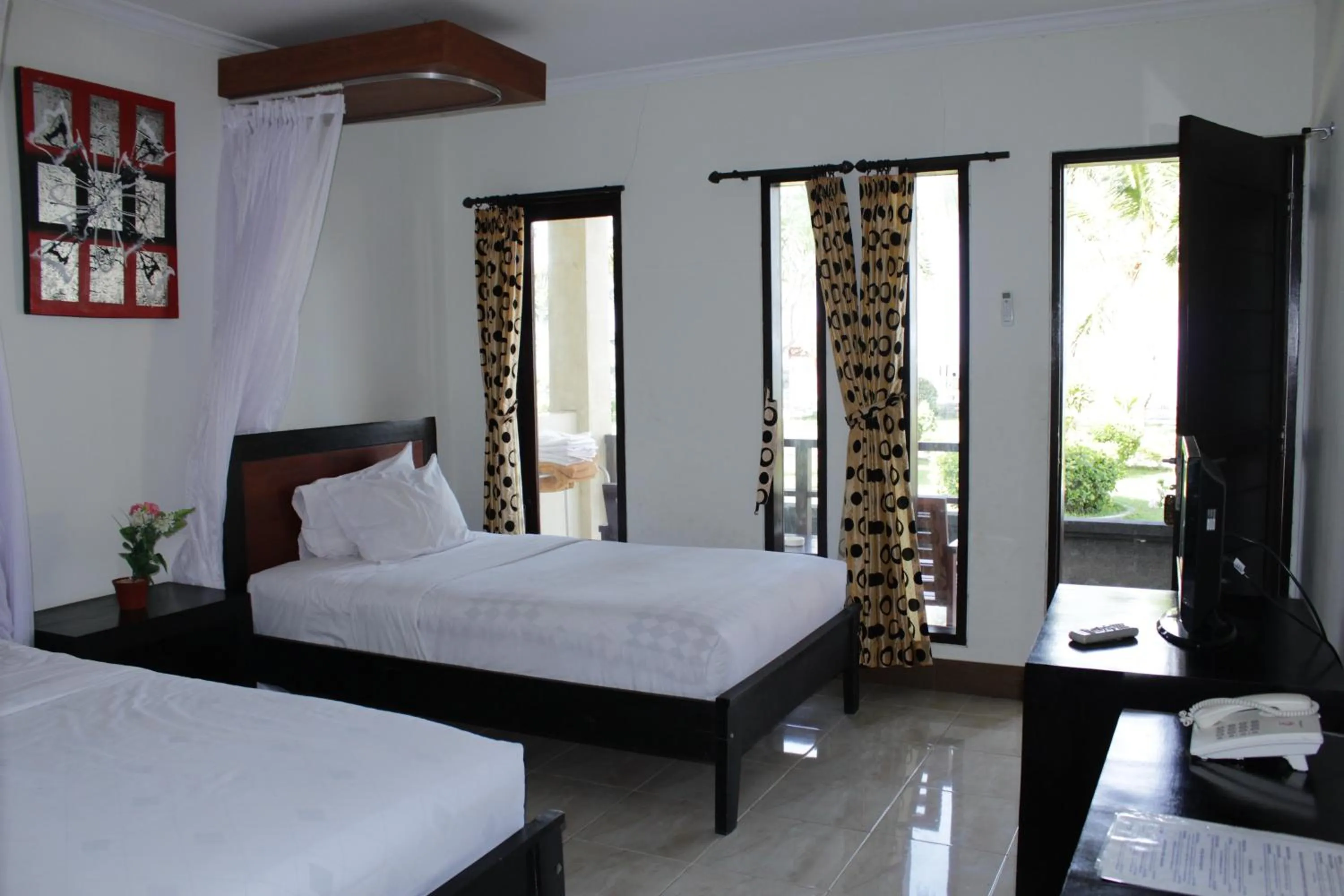 Bed in Aman Gati Hotel Lakey