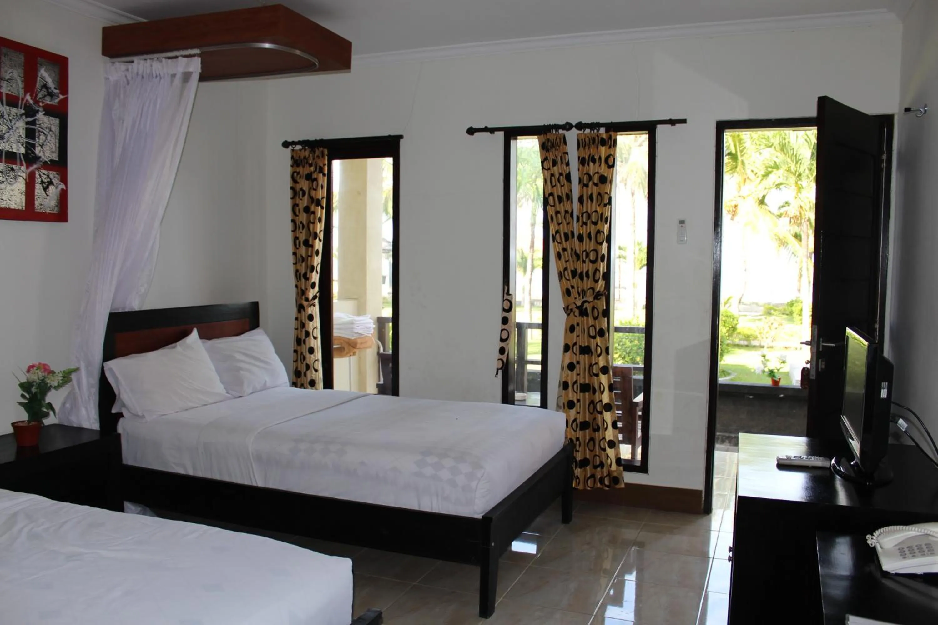 Bed in Aman Gati Hotel Lakey