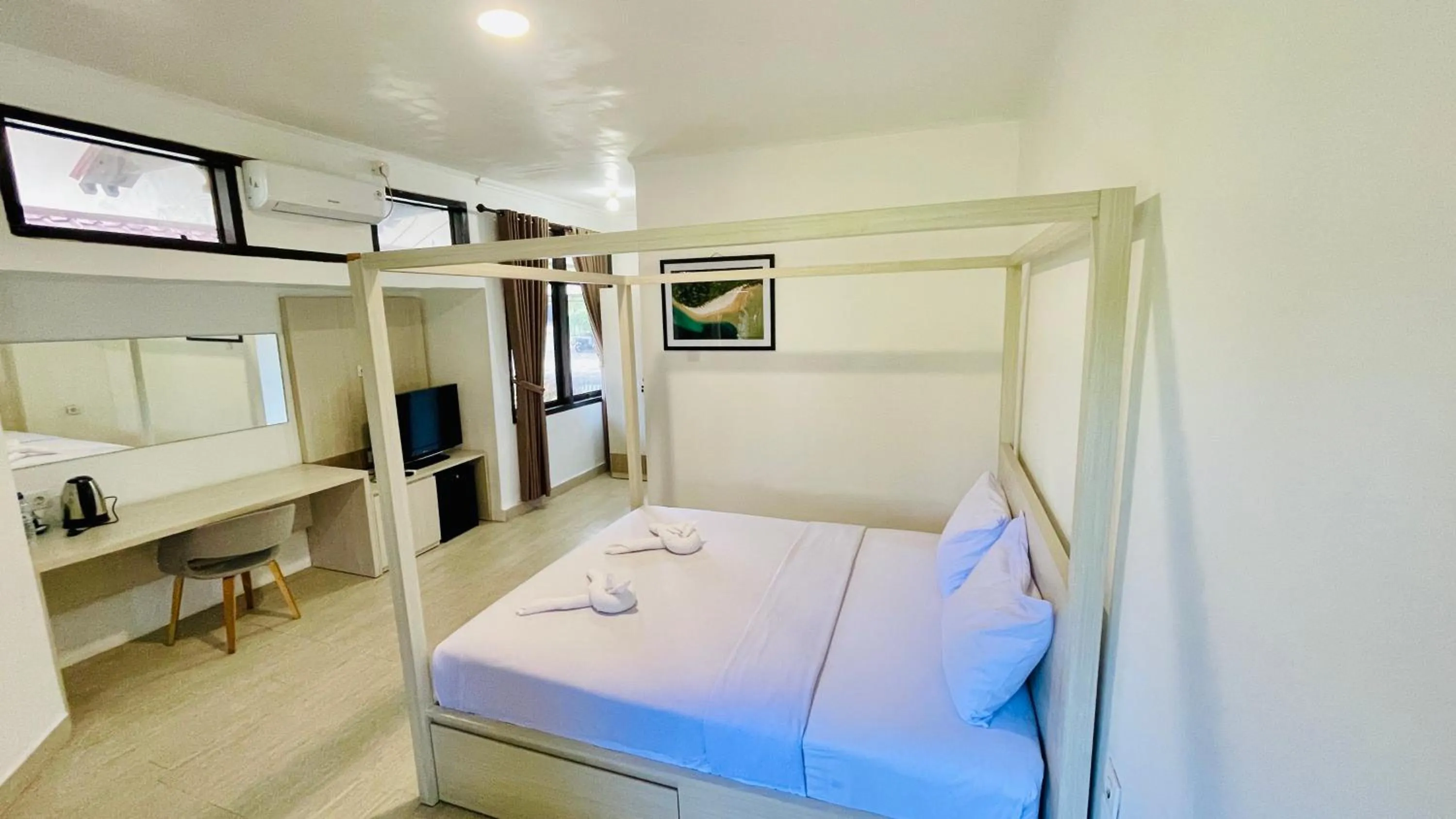 Bed in Aman Gati Hotel Lakey