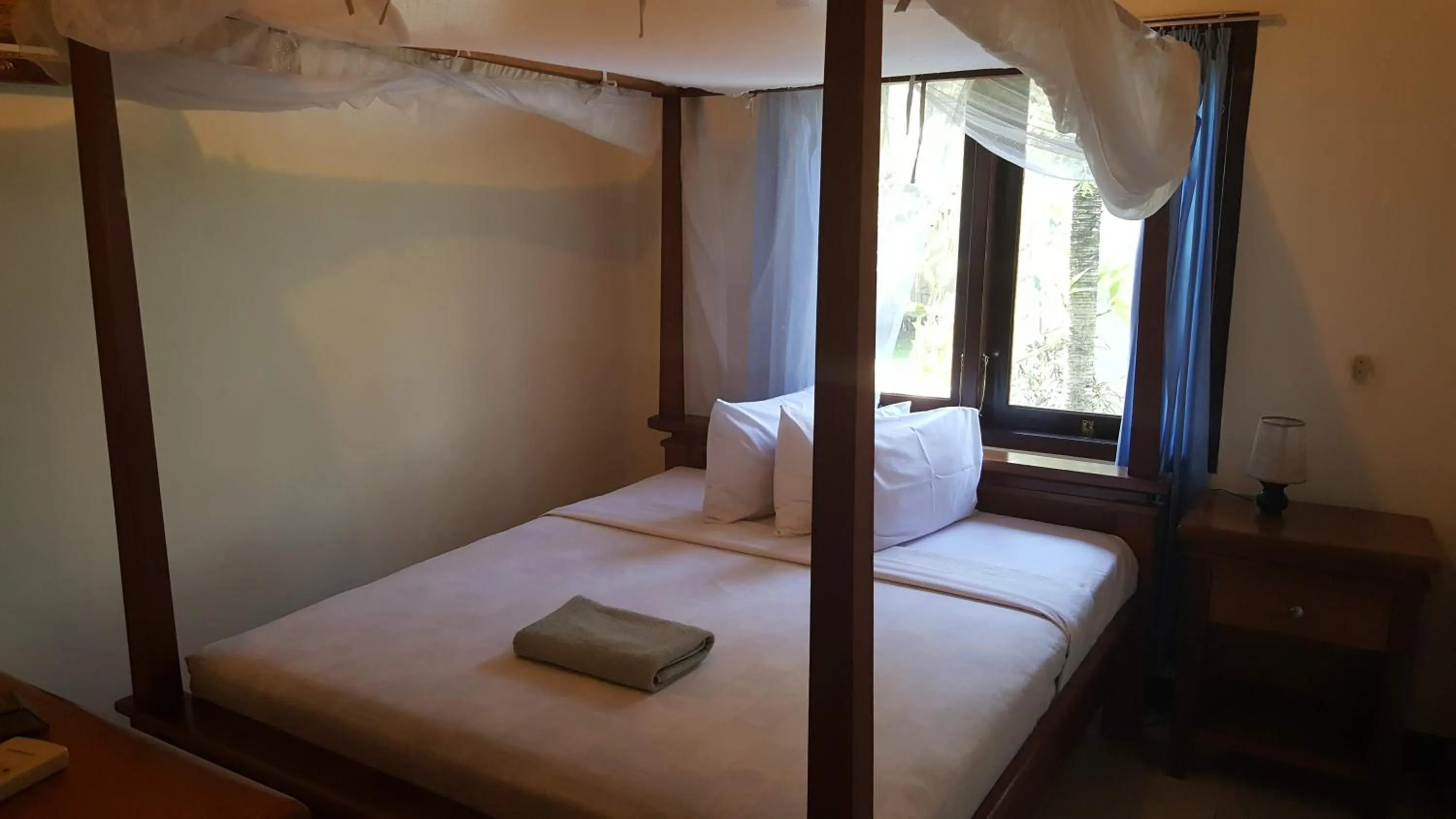 Bed in Aman Gati Hotel Lakey