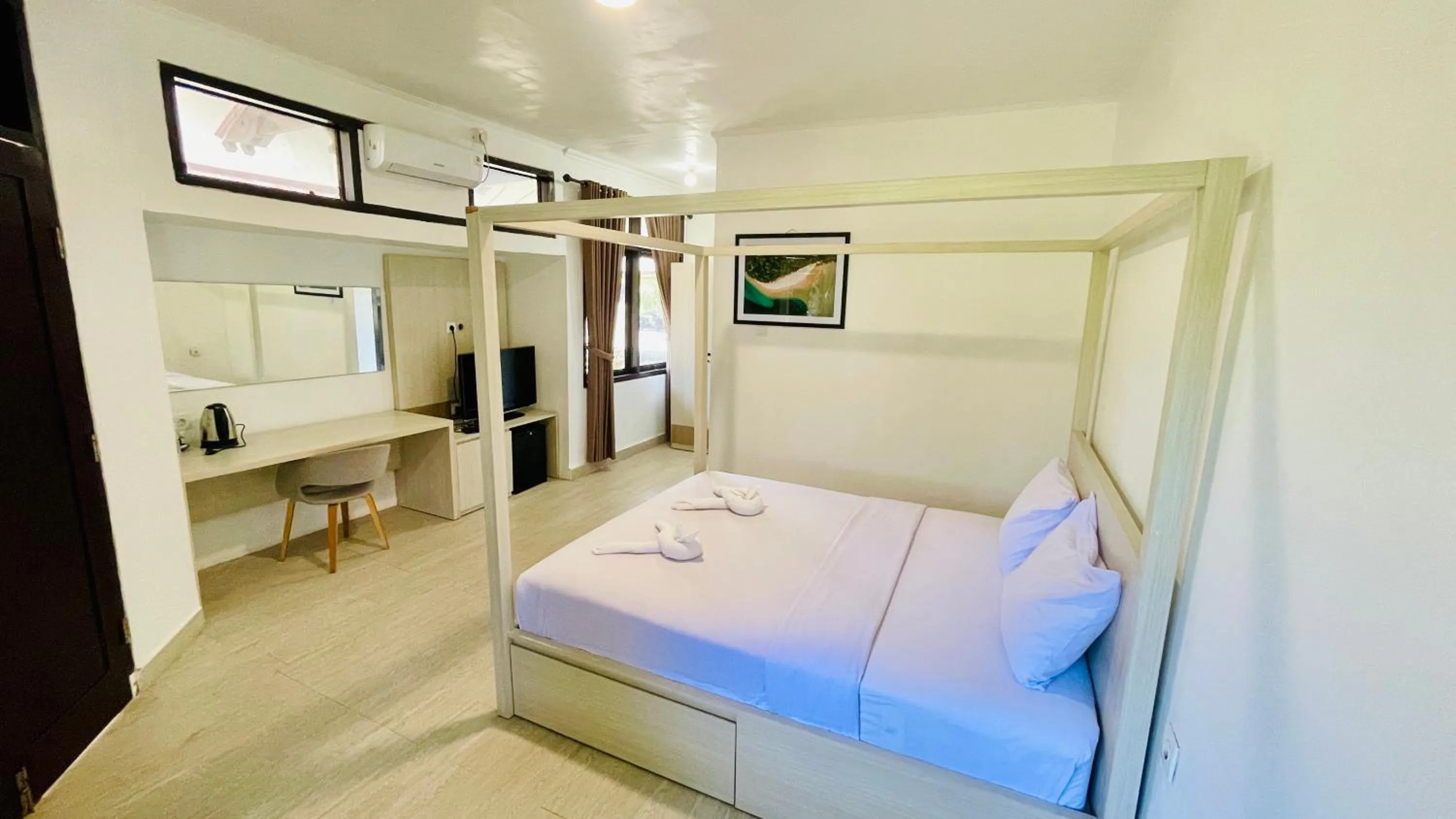 Bed in Aman Gati Hotel Lakey