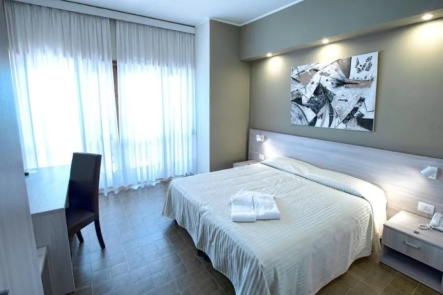 Bed in Hotel Scacciapensieri